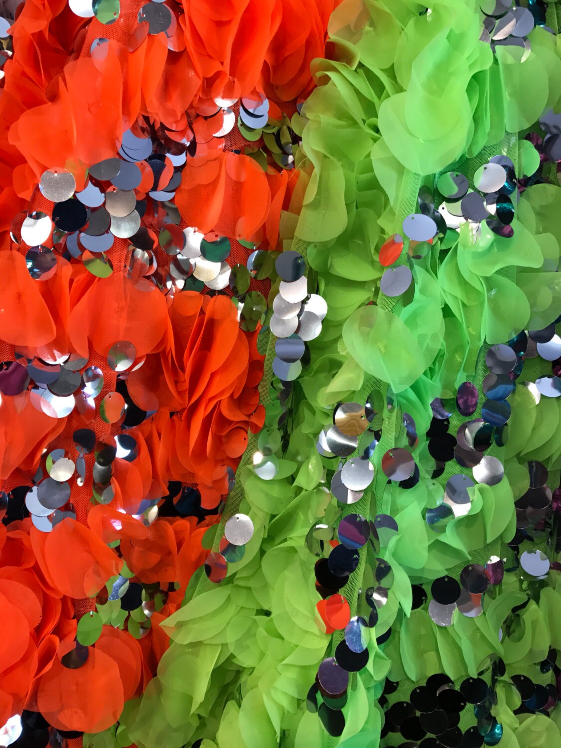 Dangling circle chiffon with big paillette silver sequins on stretch mesh base 58/60" sold by the yd. Ships worldwide from Los Angeles CA