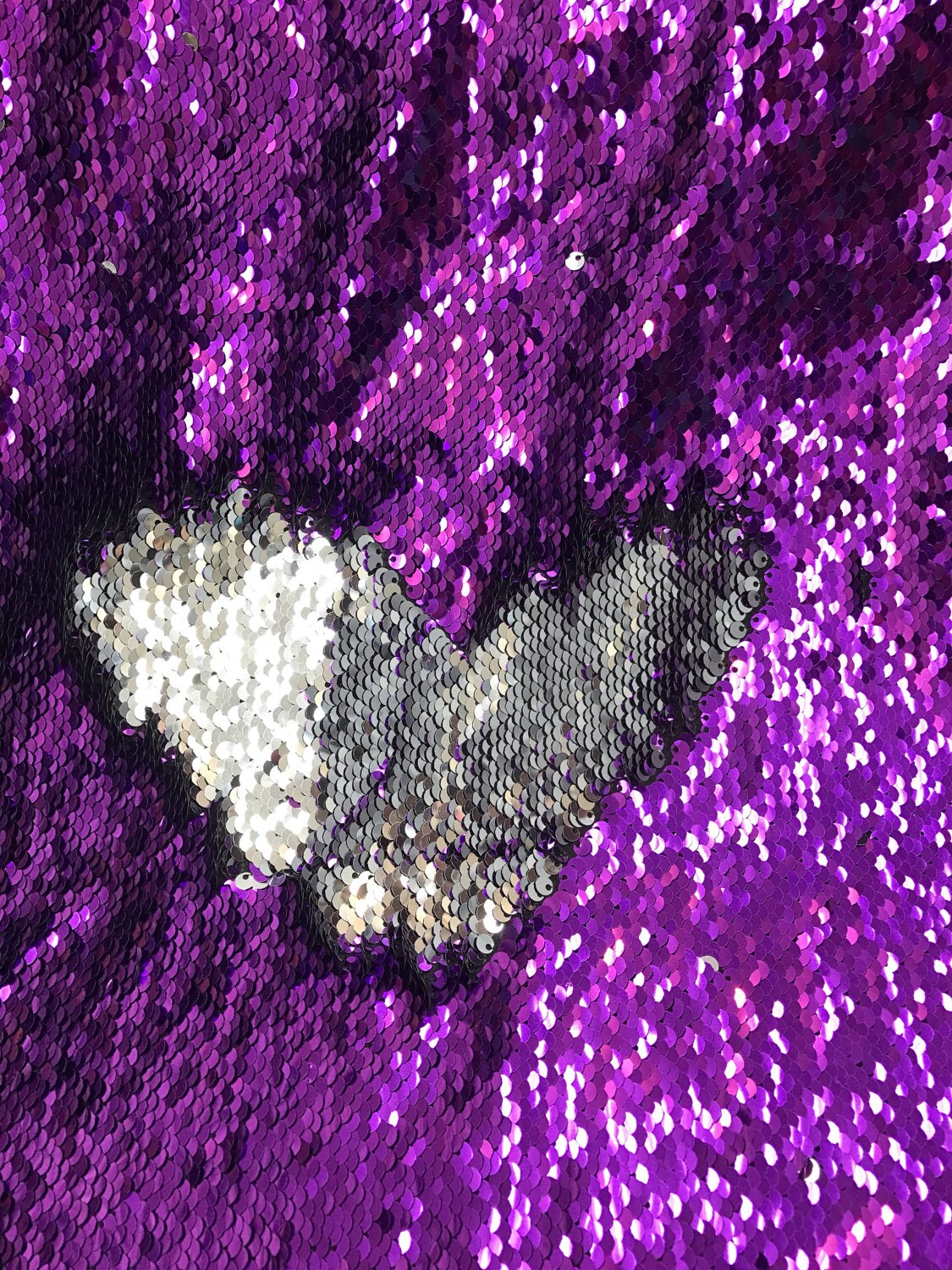 Reversible flip up sequins purple/silver 5mm seq with Lycra base 58/60" sold by the yd. Ships worldwide from Los Angeles California USA