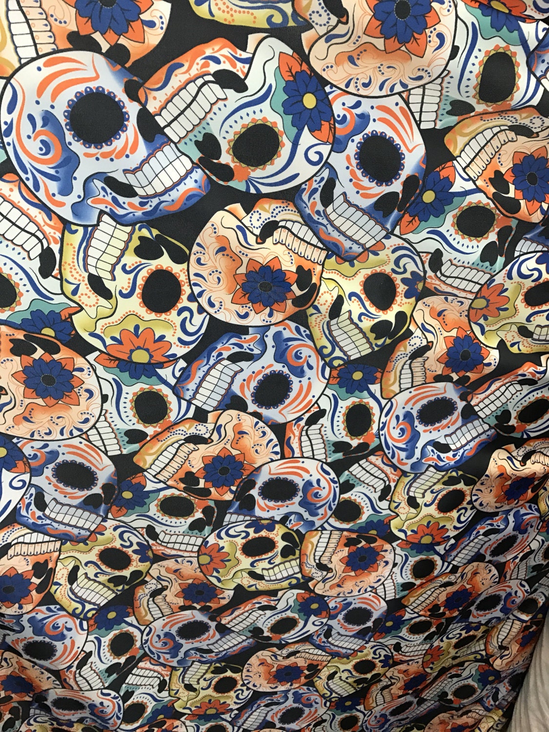 Skull design print on nylon Spandex 4way stretch 58/60" Sold by the yd. Ships worldwide from Los Angeles California USA