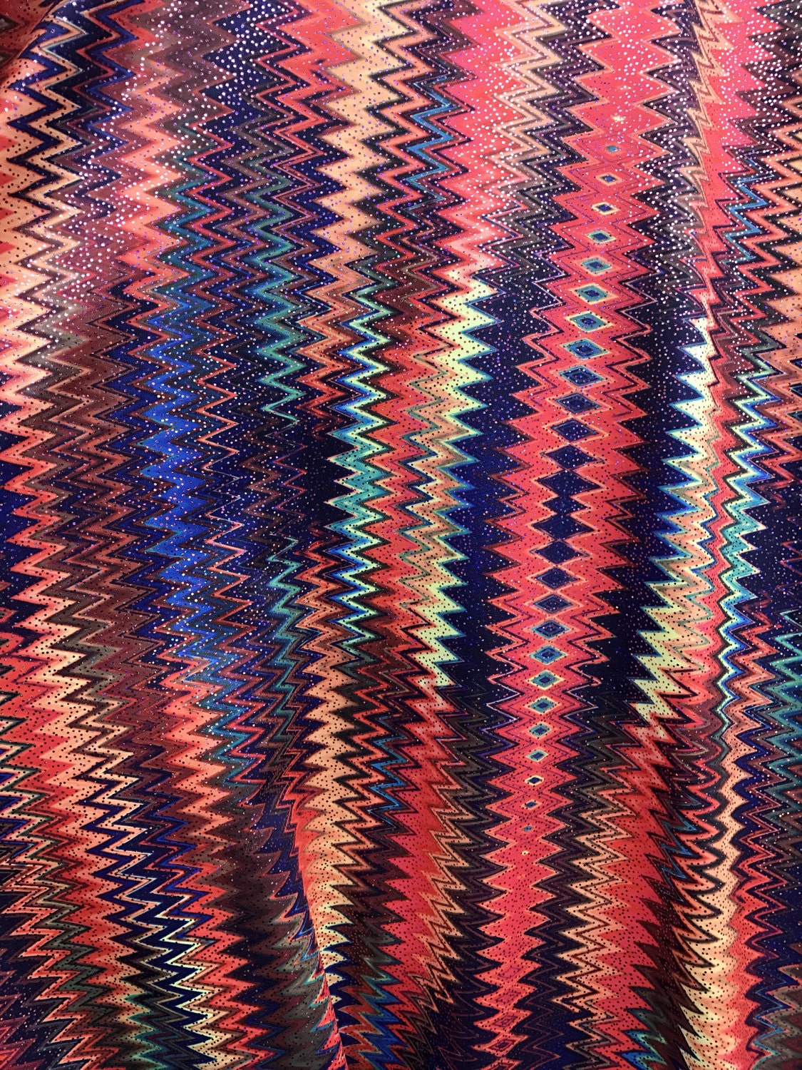 Zigzag tie dye print design on nylon spandex 4way stretch 58/60" sold by the yd. Ships worldwide from Los Angeles California USA