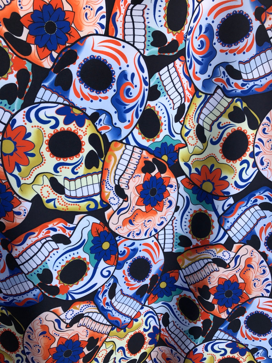 Nylon spandex 4way Stretch Day of the dead design multicolor 58/60" Sold by the yd. Ships worldwide from Los Angeles California USA.