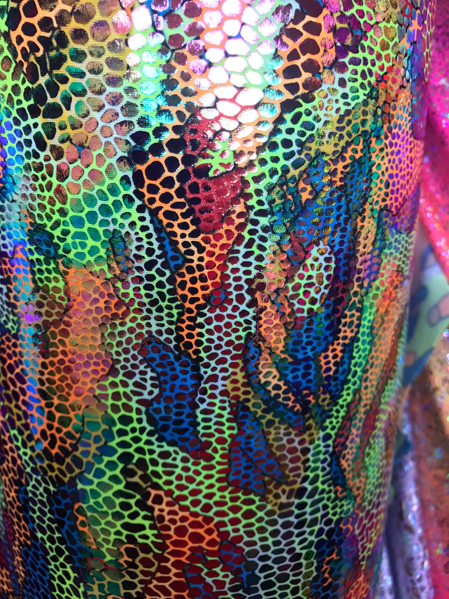 New reptile design with foil all over nylon spandex 4way Stretch 58/60" Sold by the Yd. Ships worldwide from Los Angeles California USA