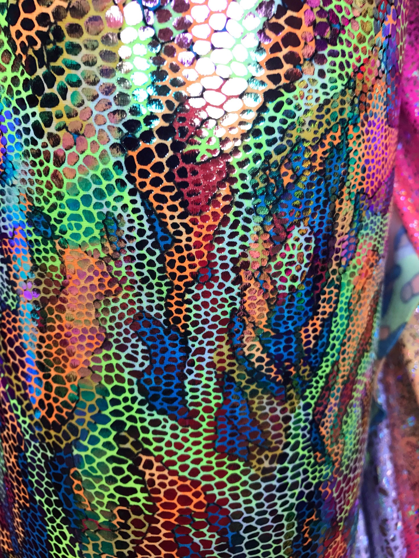 New reptile design with foil all over nylon spandex 4way Stretch 58/60" Sold by the Yd. Ships worldwide from Los Angeles California USA
