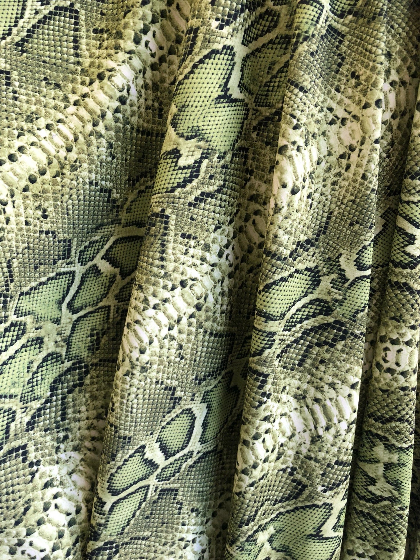 New nylon spandex snake design sage color 2tone 4way Stretch 58/69" Sold by the YD. Ships worldwide from Los Angeles California USA.