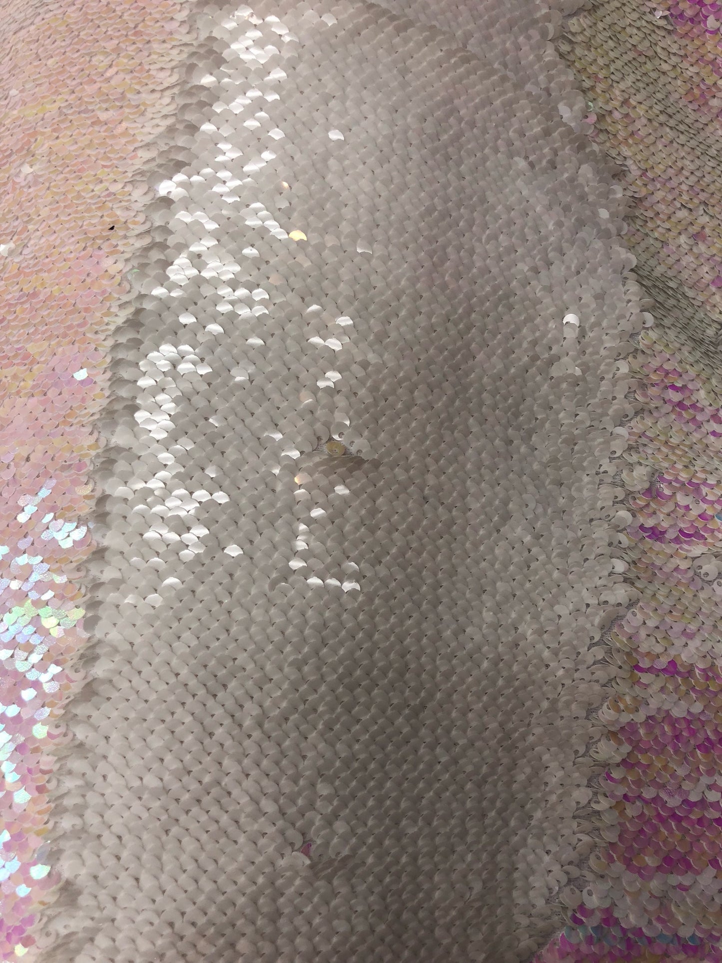 Mermaid sequins iridescent white 2tone with spandex base 2 way Stretch 58/60" Sold by the YD. Ships worldwide from Los Angeles California.