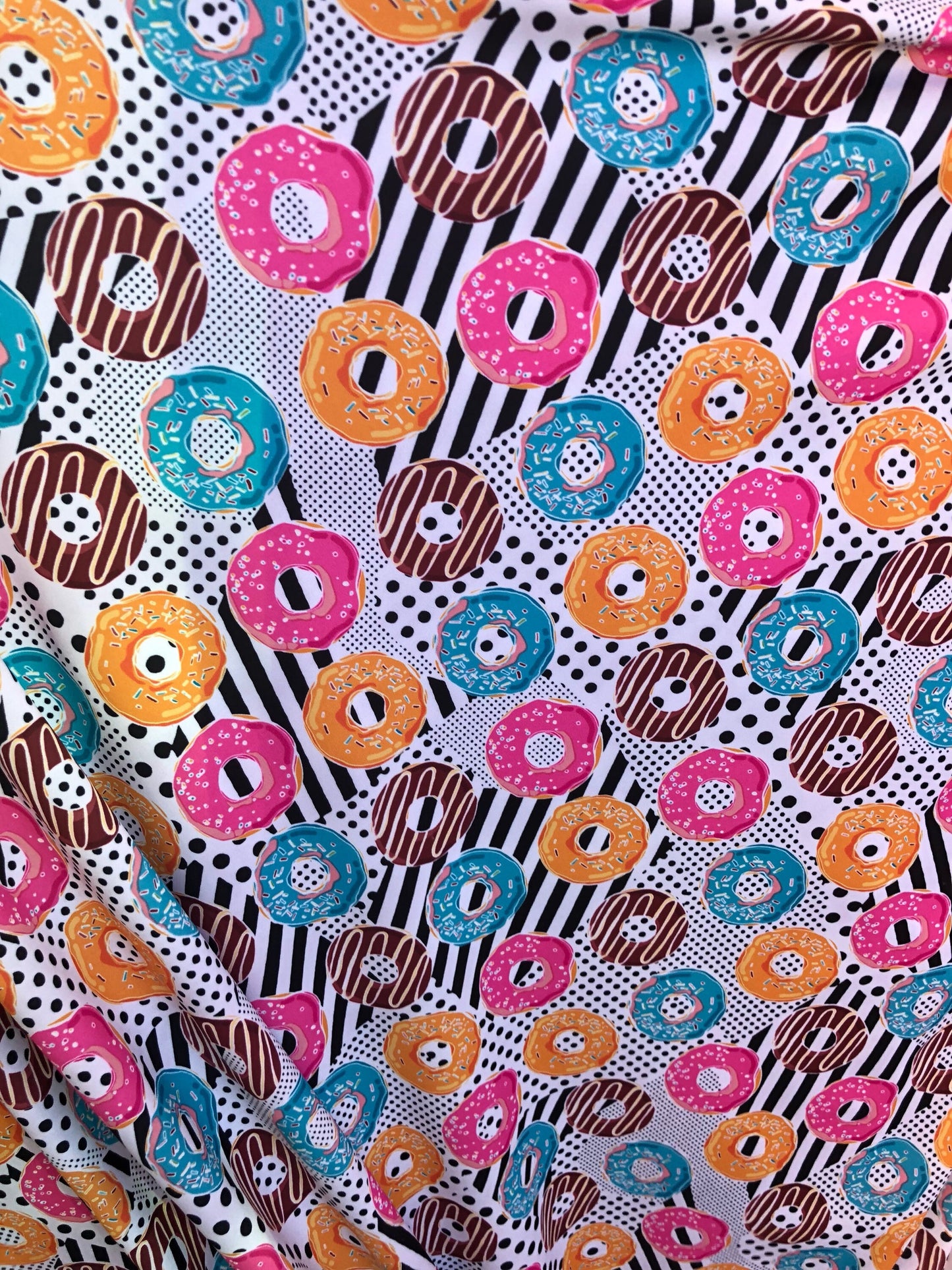 New print yum yum donuts design multi nylon spandex 4way Stretch 58/60" Sold by the yd. Ships worldwide from Los Angeles California USA.