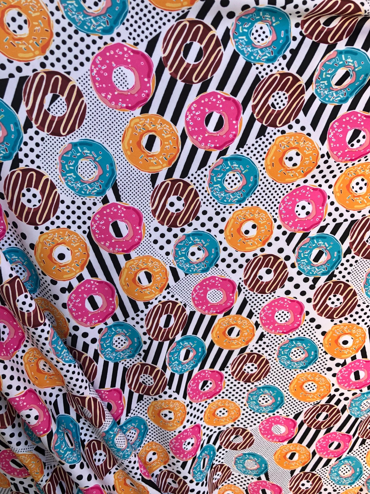 New print yum yum donuts design multi nylon spandex 4way Stretch 58/60" Sold by the yd. Ships worldwide from Los Angeles California USA.