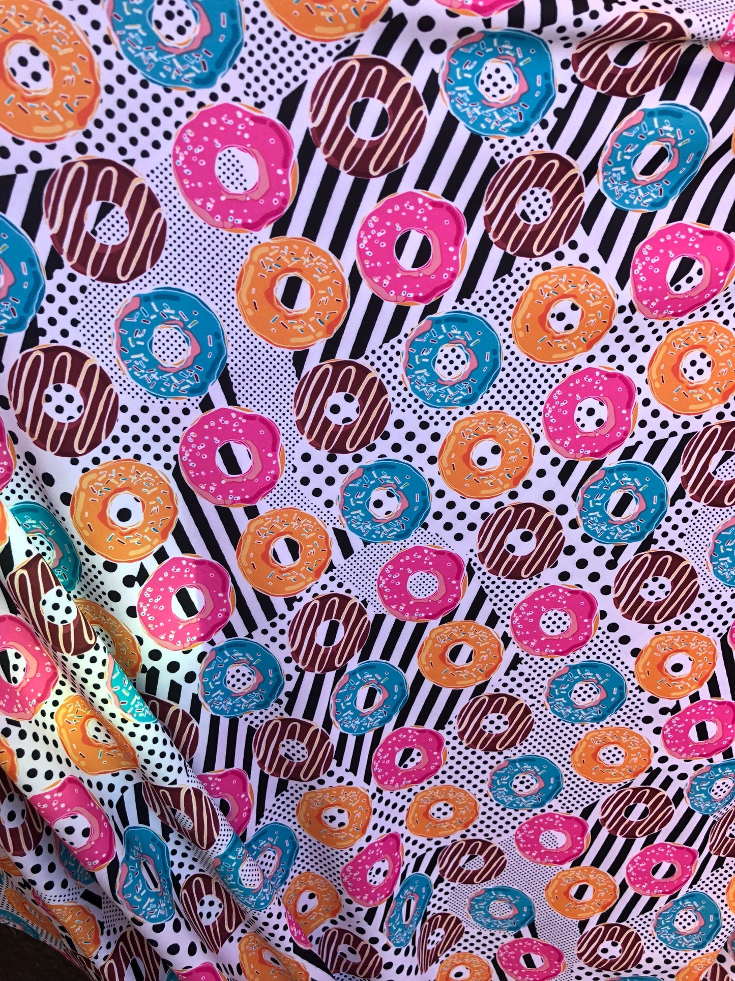 New print yum yum donuts design multi nylon spandex 4way Stretch 58/60" Sold by the yd. Ships worldwide from Los Angeles California USA.