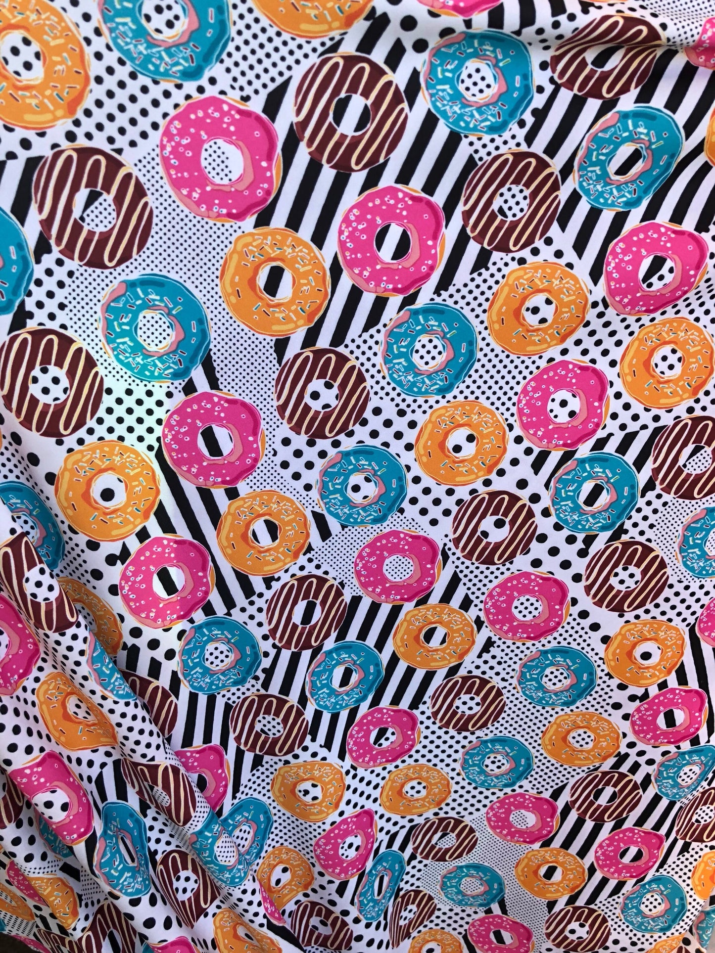 New print yum yum donuts design multi nylon spandex 4way Stretch 58/60" Sold by the yd. Ships worldwide from Los Angeles California USA.