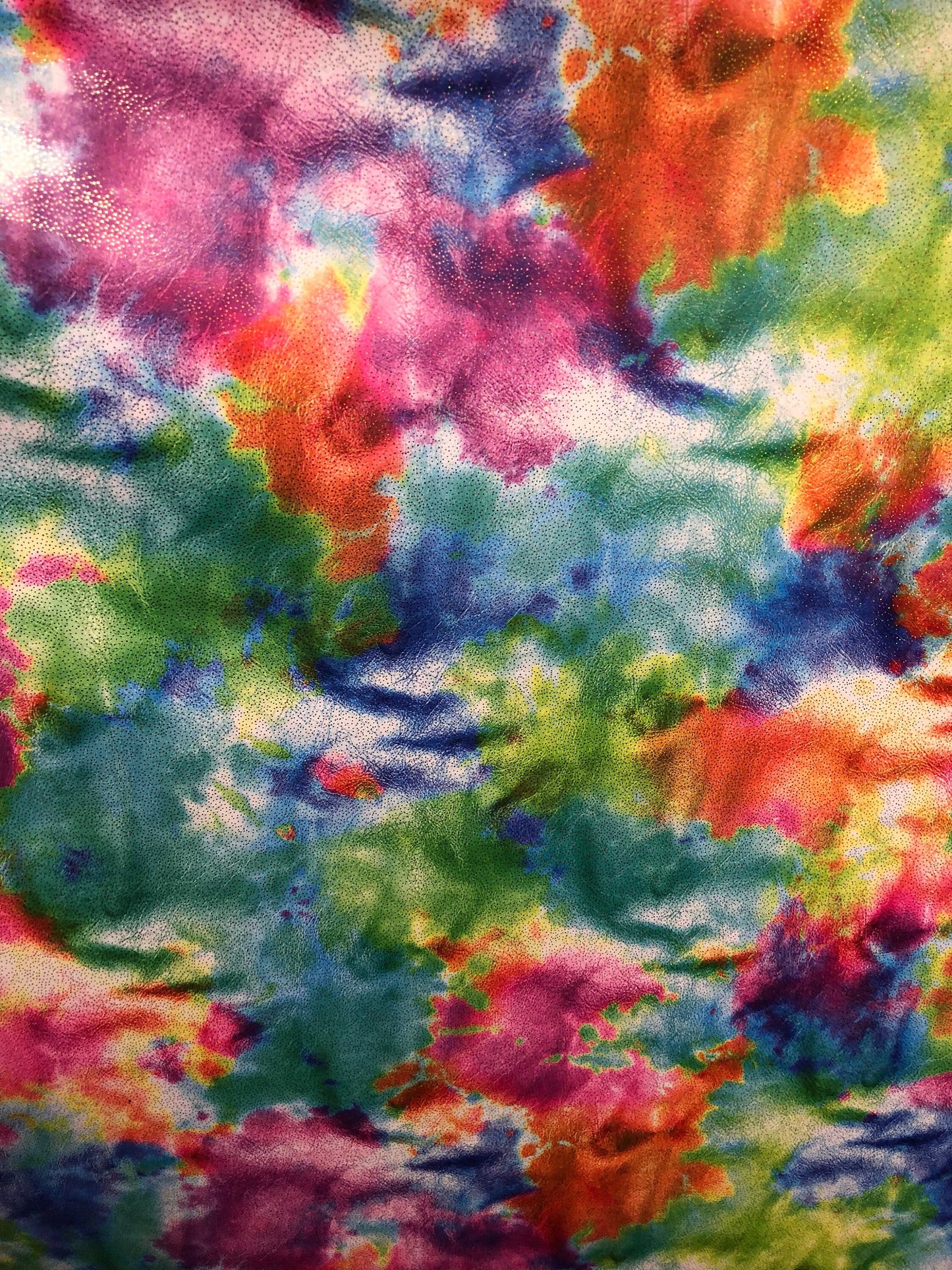 New tie dye nylon spandex with foil all over 4way Stretch 58/60" Sold by the YD. Ships worldwide from Los Angeles California USA.