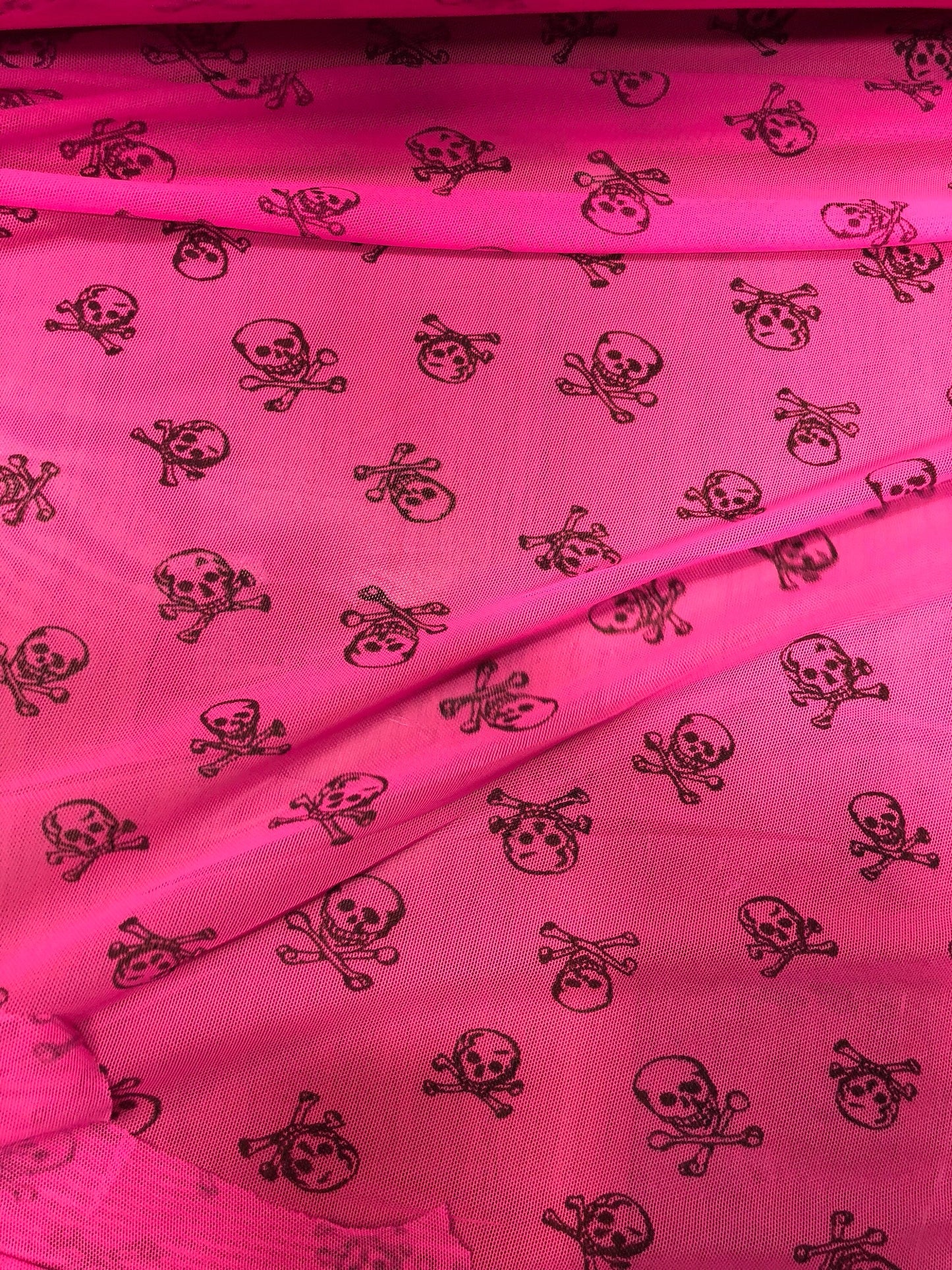 New power mesh skull design nylon mesh neon pink 4way Stretch 58/60" Sold by the YD. Ships Worldwide from Los Angeles California USA.
