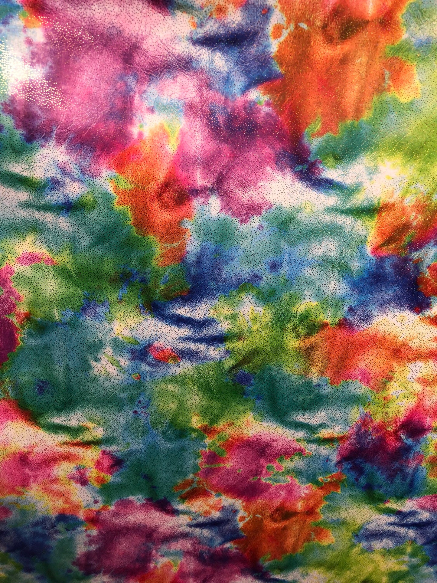 New tie dye nylon spandex with foil all over 4way Stretch 58/60" Sold by the YD. Ships worldwide from Los Angeles California USA.