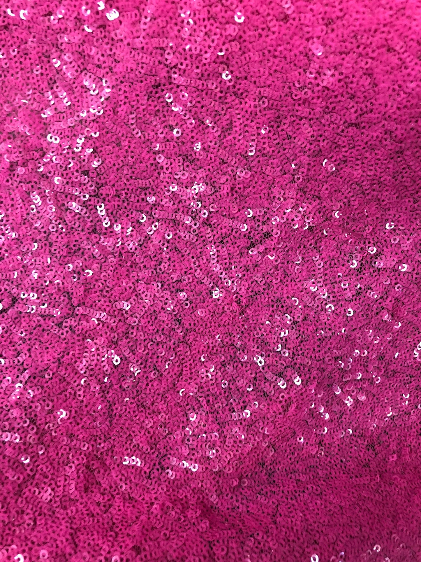 New mini glitz sequins on stretch mesh bubblegum pink 2way stretch 55/57" Sold by the YD. Ships worldwide from Los Angeles California USA.