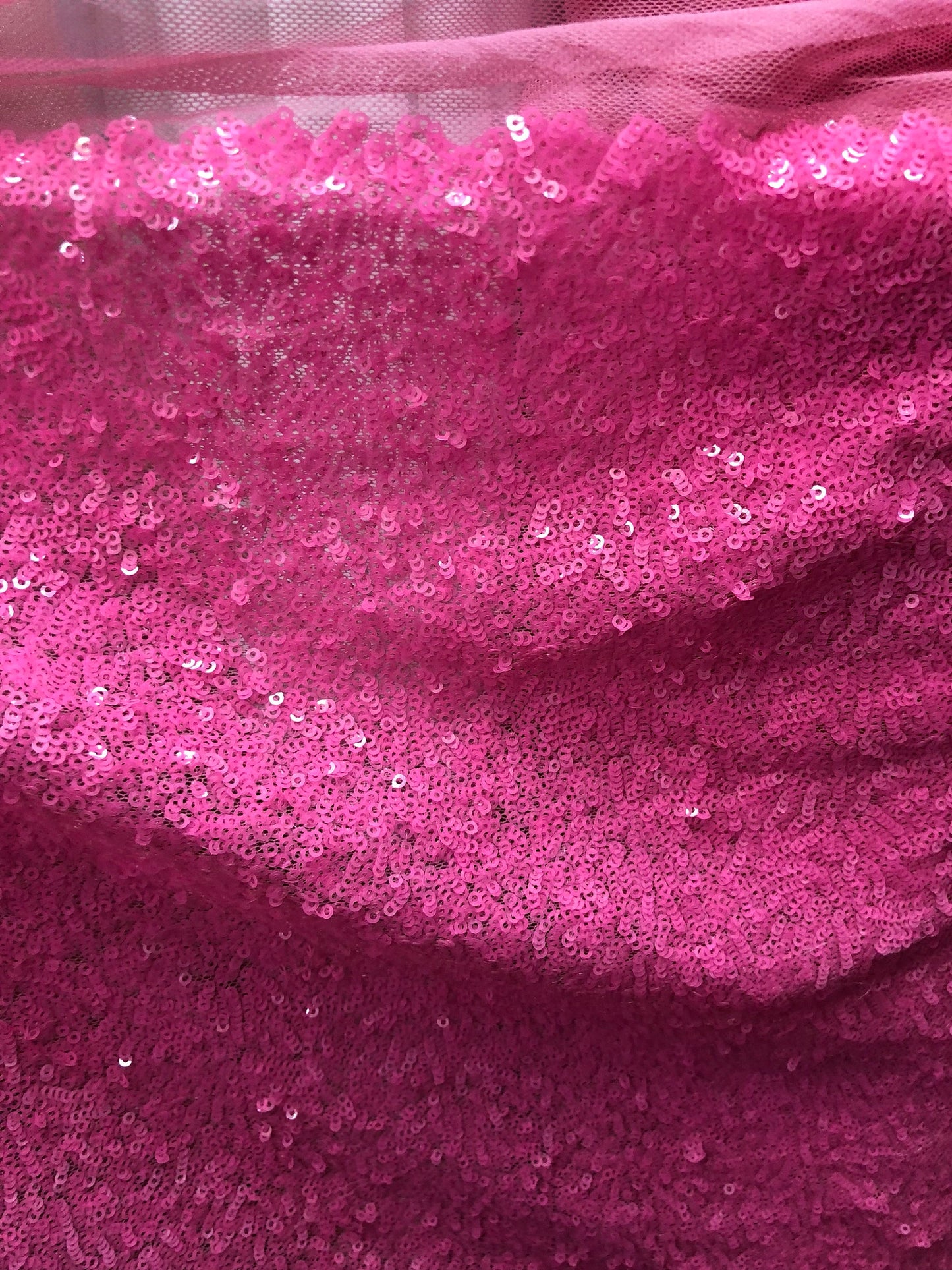 New mini glitz sequins on stretch mesh bubblegum pink 2way stretch 55/57" Sold by the YD. Ships worldwide from Los Angeles California USA.