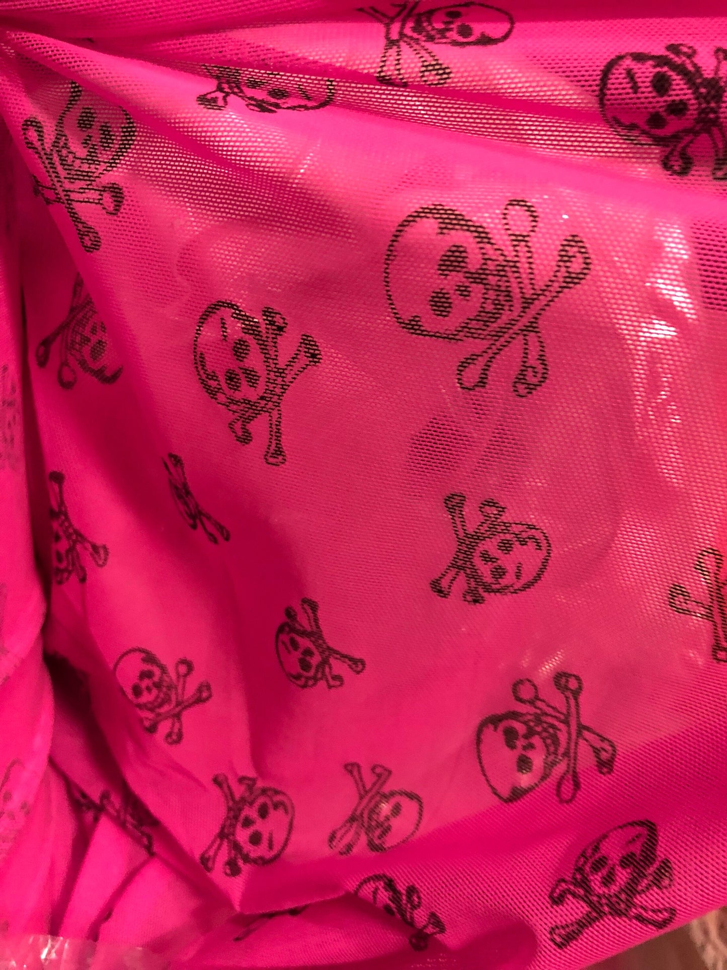 New power mesh skull desin 4 way stretch 58/60" Sold by the YD. Ships worldwide from Los Angeles California USA.