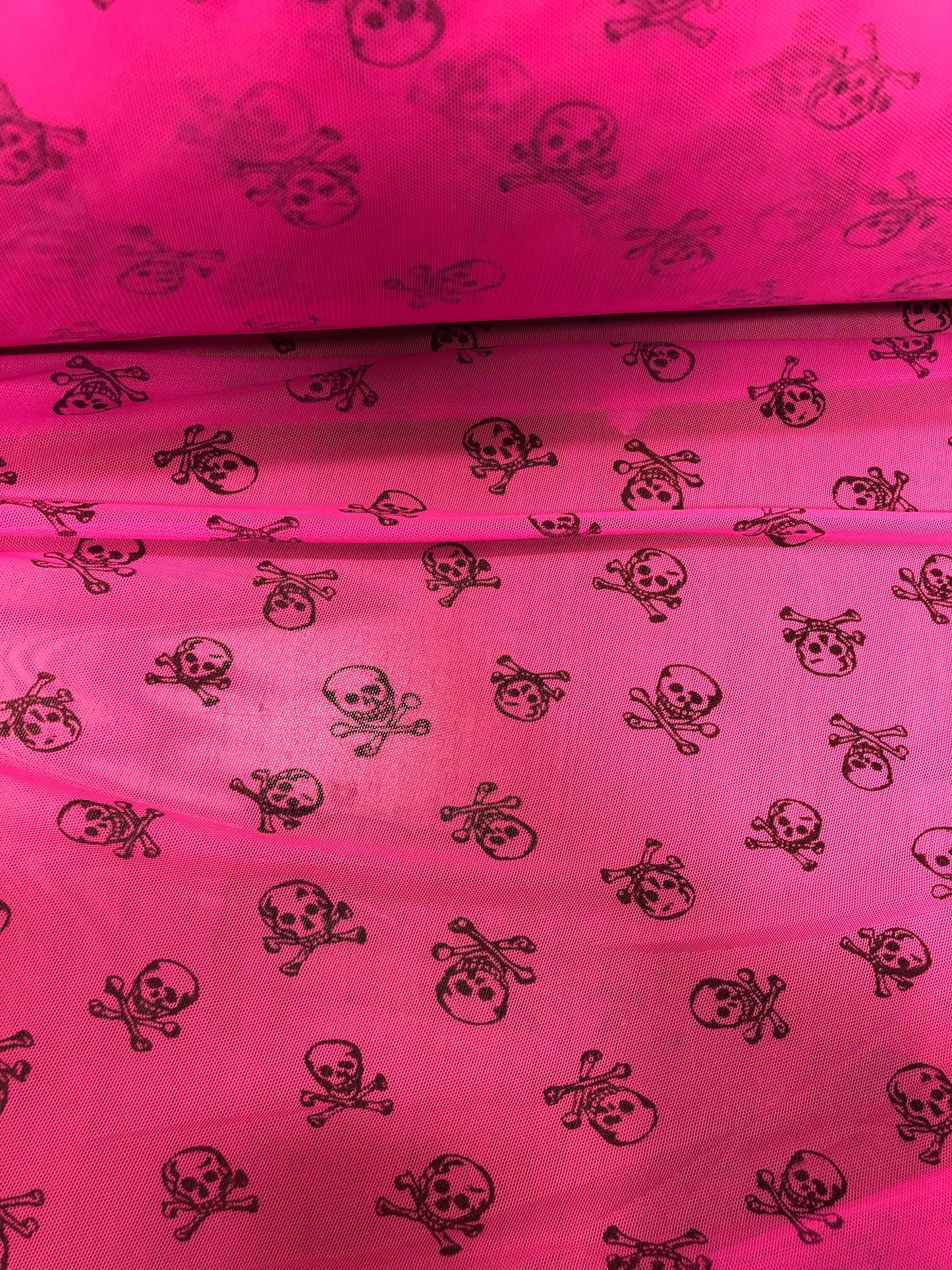 New power mesh skull design nylon mesh neon pink 4way Stretch 58/60" Sold by the YD. Ships Worldwide from Los Angeles California USA.