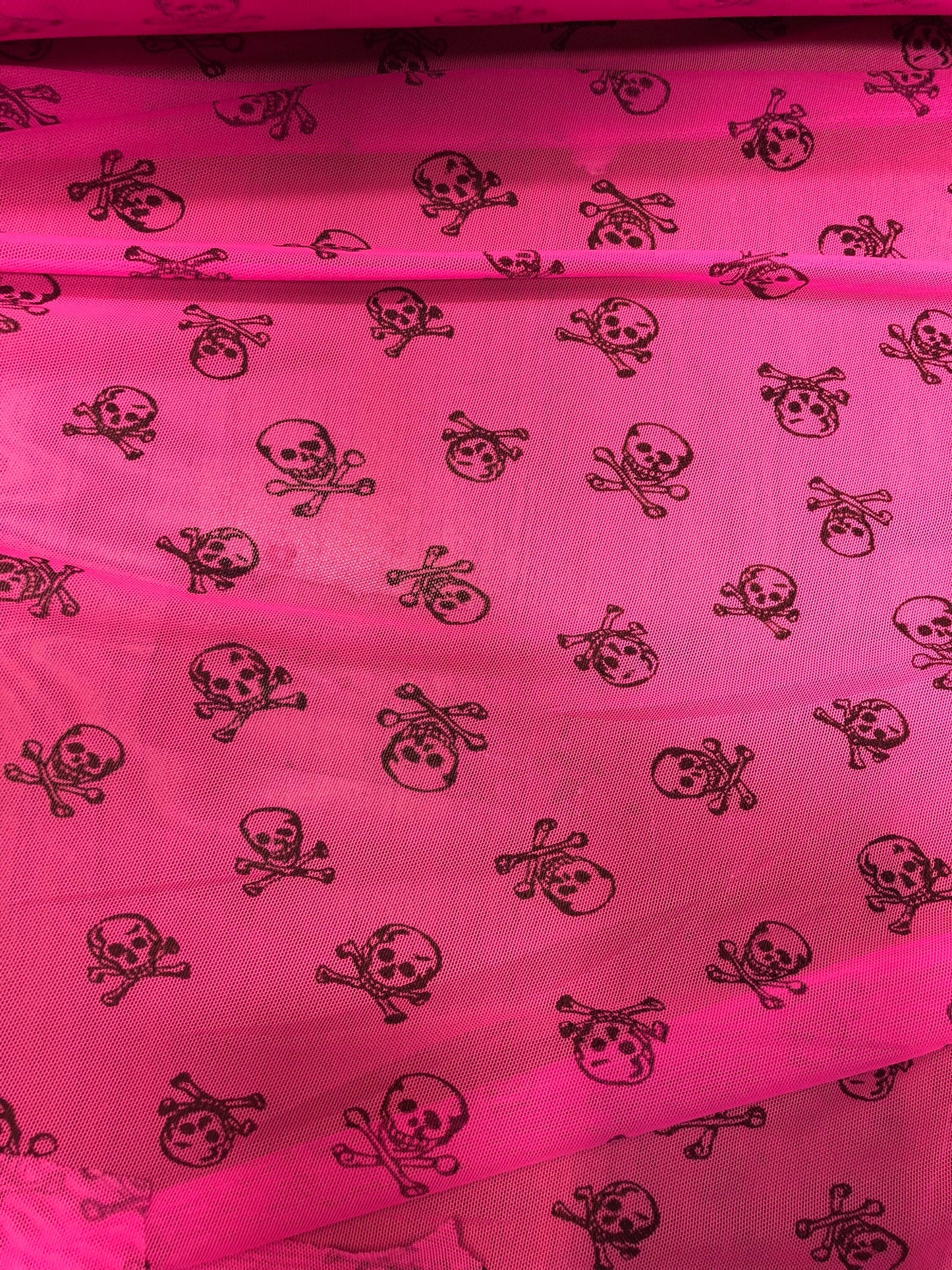 New power mesh skull design nylon mesh neon pink 4way Stretch 58/60" Sold by the YD. Ships Worldwide from Los Angeles California USA.