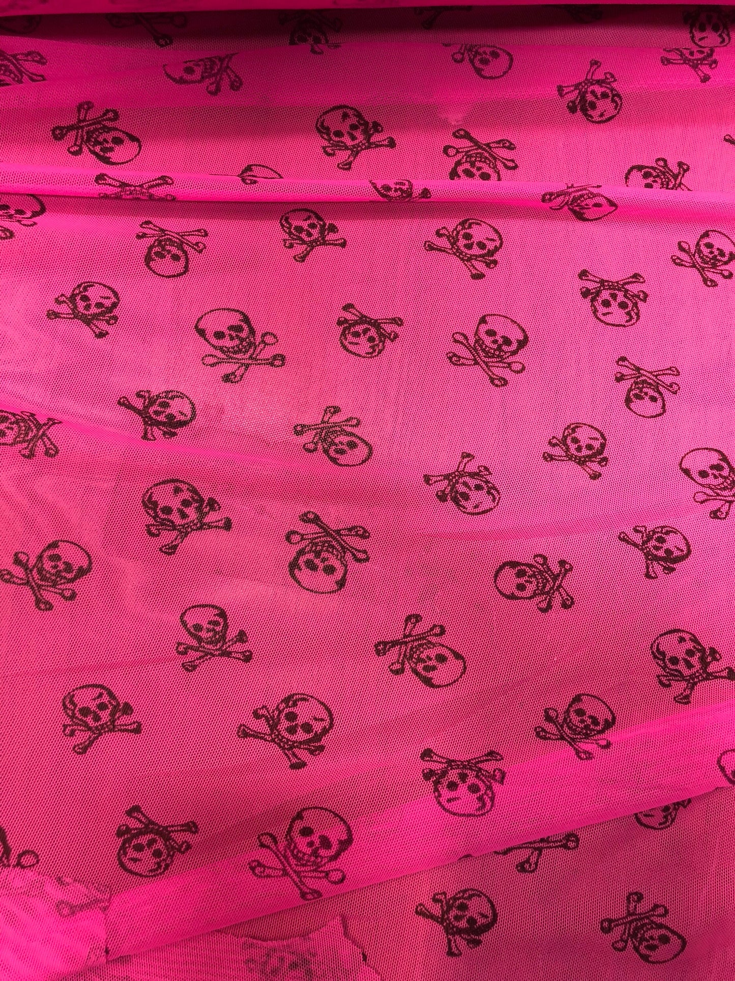 New power mesh skull design nylon mesh neon pink 4way Stretch 58/60" Sold by the YD. Ships Worldwide from Los Angeles California USA.