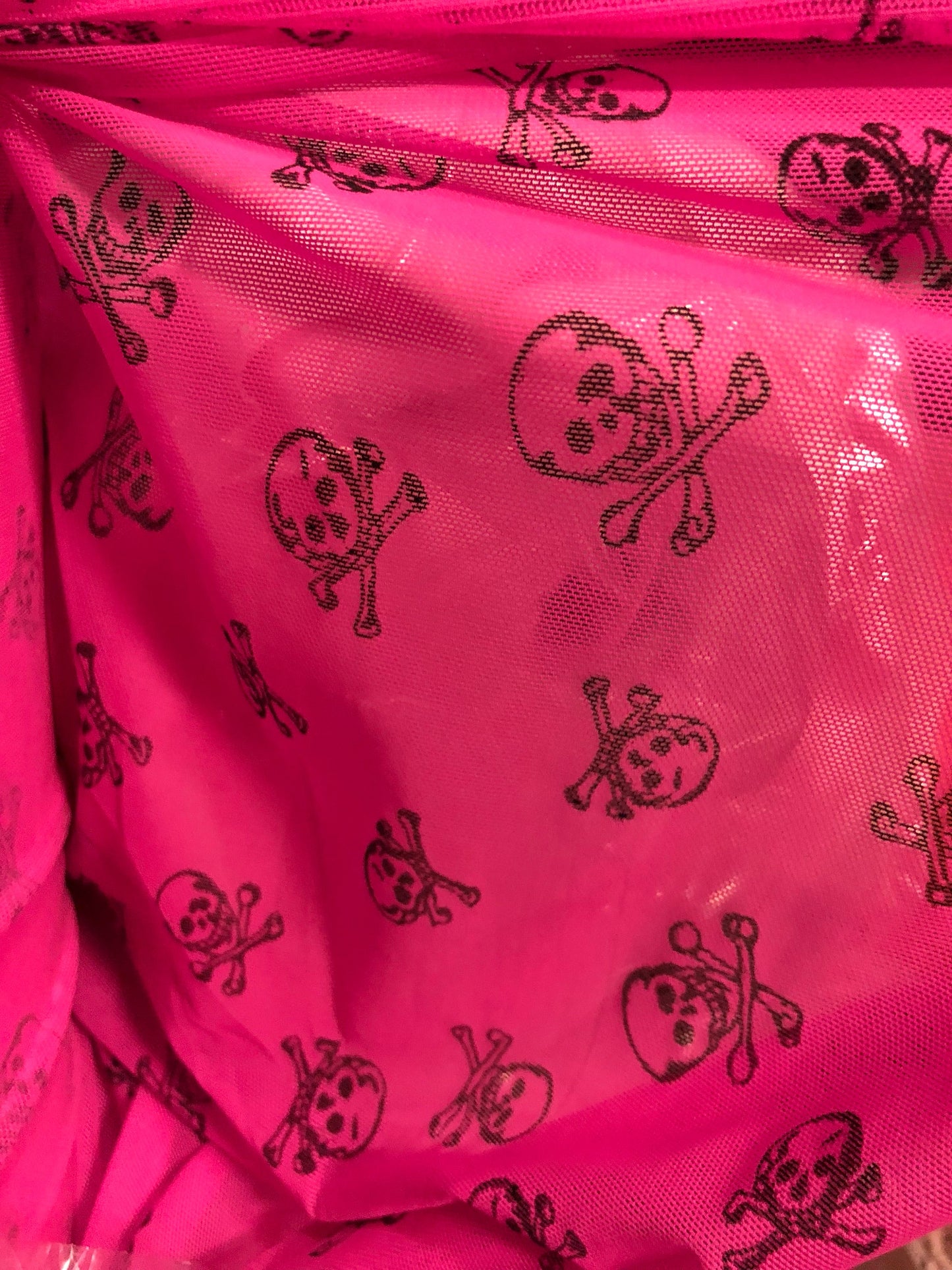 New power mesh skull desin 4 way stretch 58/60" Sold by the YD. Ships worldwide from Los Angeles California USA.