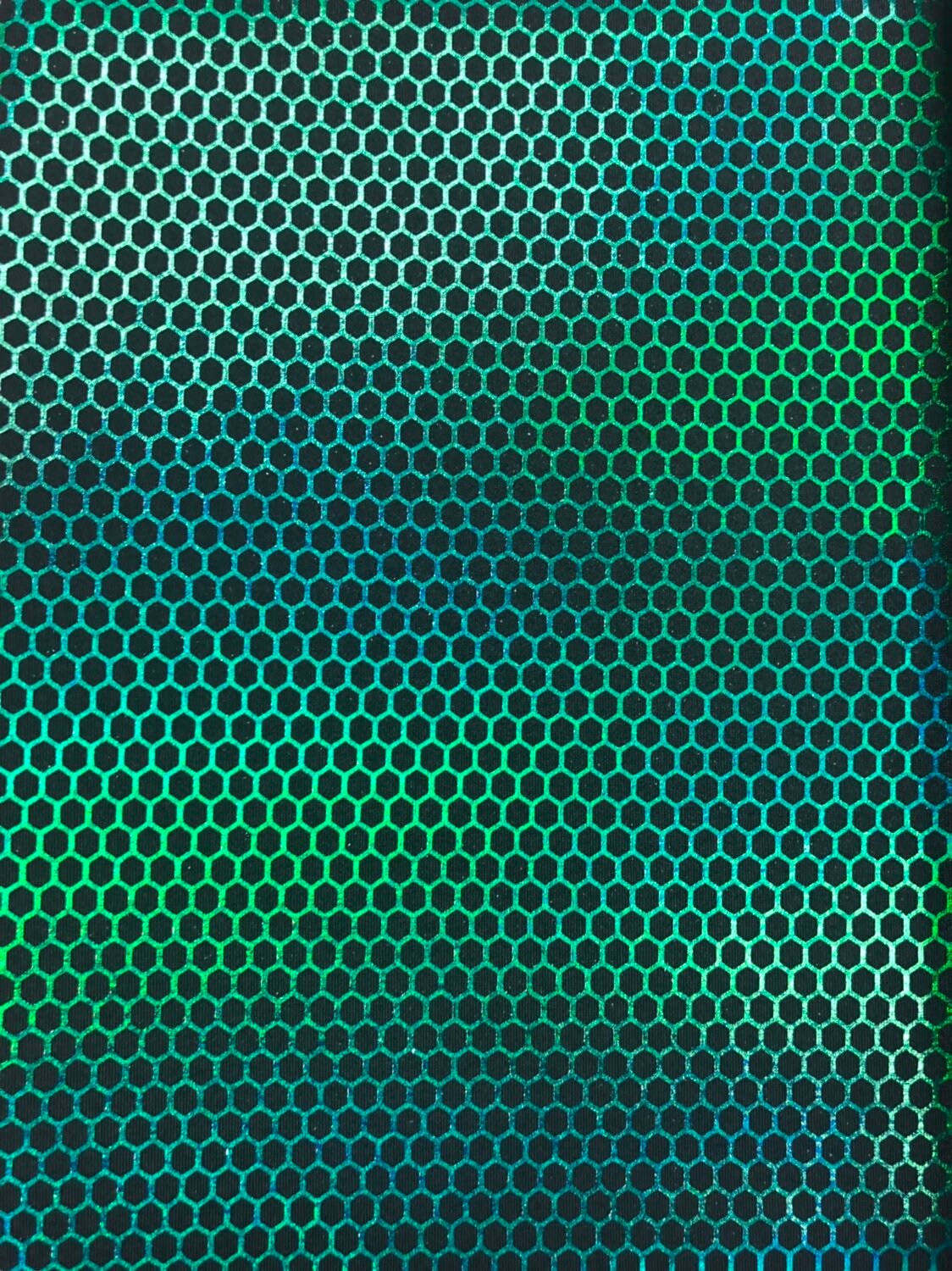 Honeycomb print hologram foil metallic nylon spandex 4way stretch 58/60" Sold by the YD. Ships worldwide from Los Angeles California USA
