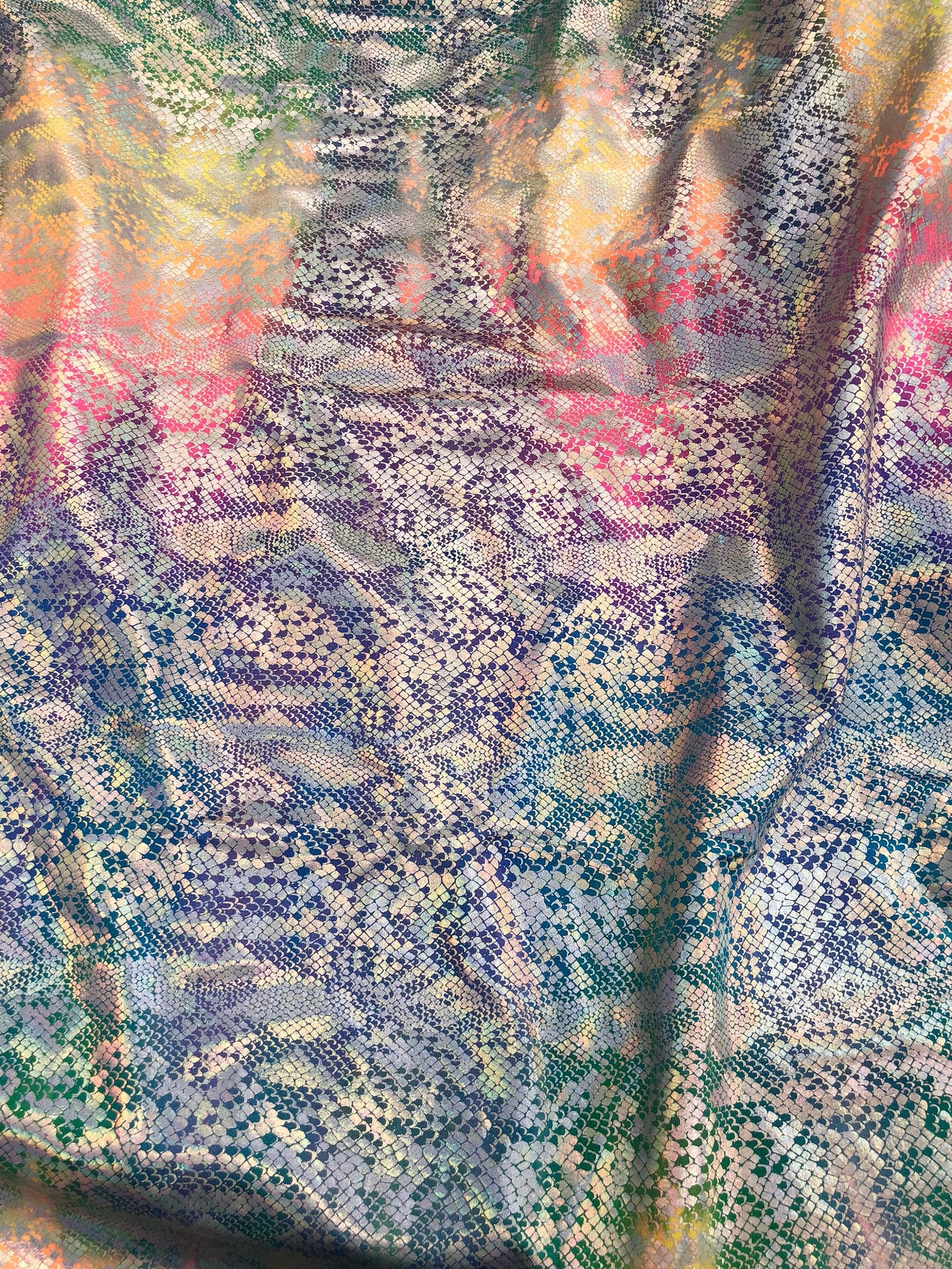 New metallic nylon spandex tie dye iridescent snake foil 4way stretch 58/60" Sold by the YD. Ships worldwide from Los Angeles California USA