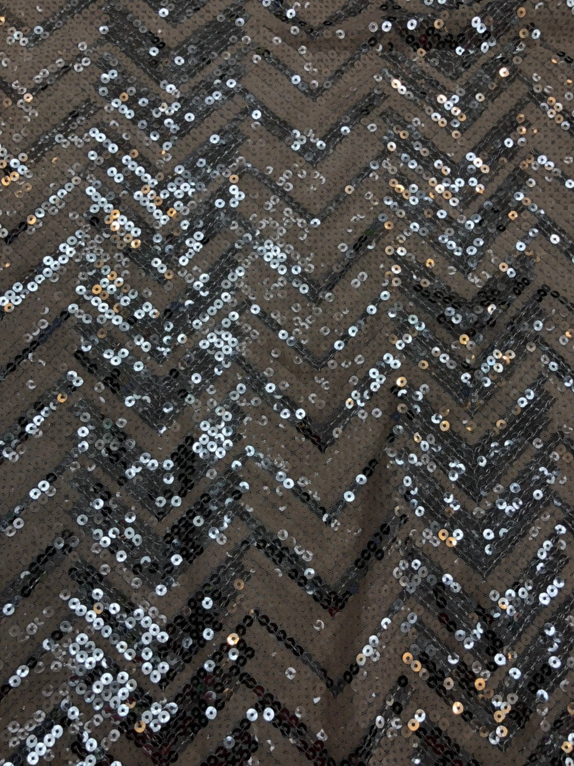 Mesh with viva sequins chevron design blush/silver 2way stretch 52/54" Sold by the YD. Ships worldwide from Los Angeles California USA.