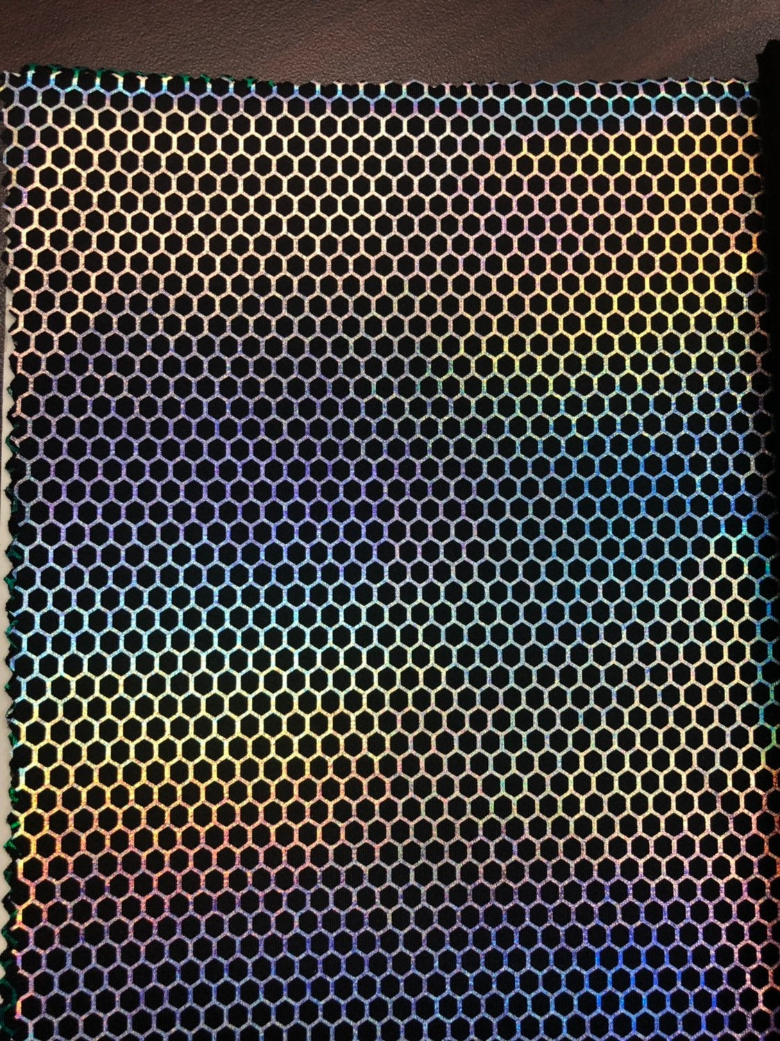 Honeycomb print hologram foil metallic nylon spandex 4way stretch 58/60" Sold by the YD. Ships worldwide from Los Angeles California USA