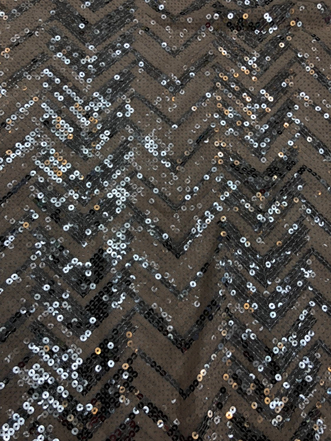 Mesh with viva sequins chevron design blush/silver 2way stretch 52/54" Sold by the YD. Ships worldwide from Los Angeles California USA.