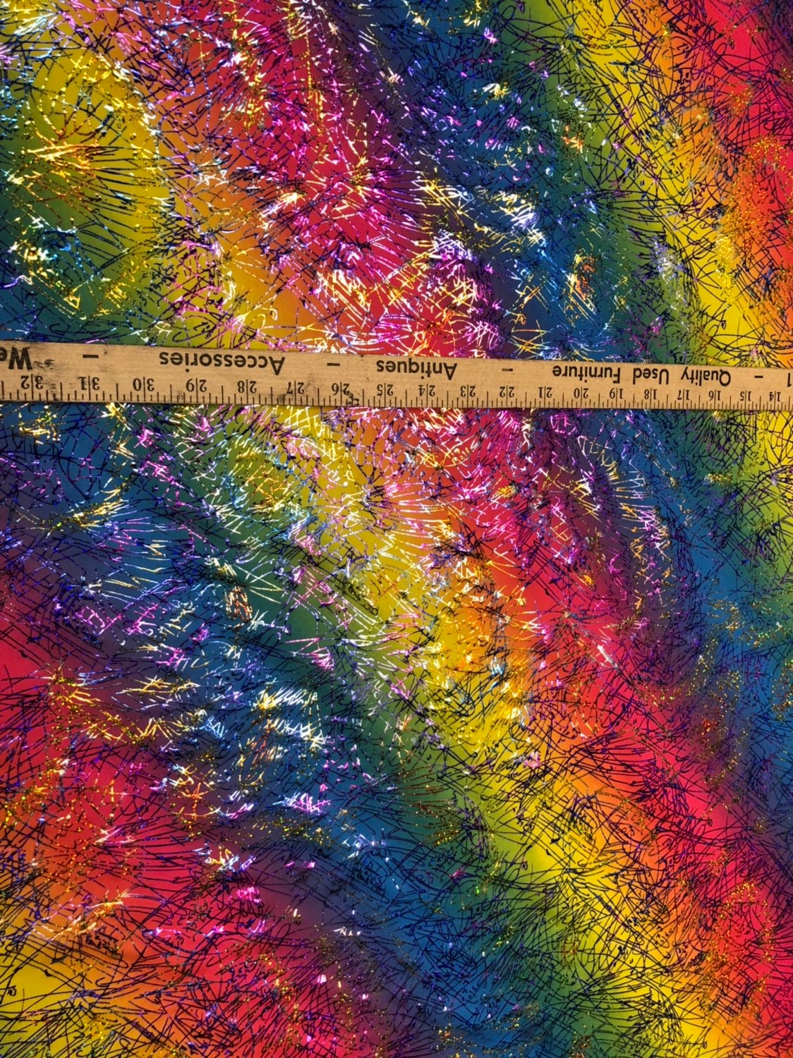 Bang bang design multicolor hologram foil print in nylon spandex 4way stretch 58/60" Sold by the YD. Ships worldwide from Los Angeles CA USA