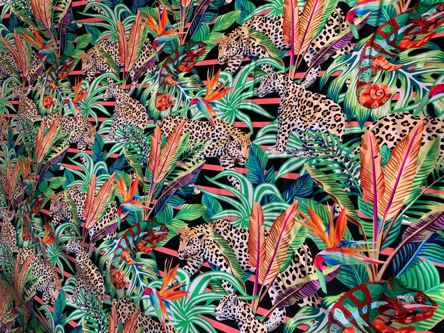 Leopard design print on heavy nylon spandex 4way stretch 58/60" Sold by the YD. Ships worldwide from Los Angeles California USA.