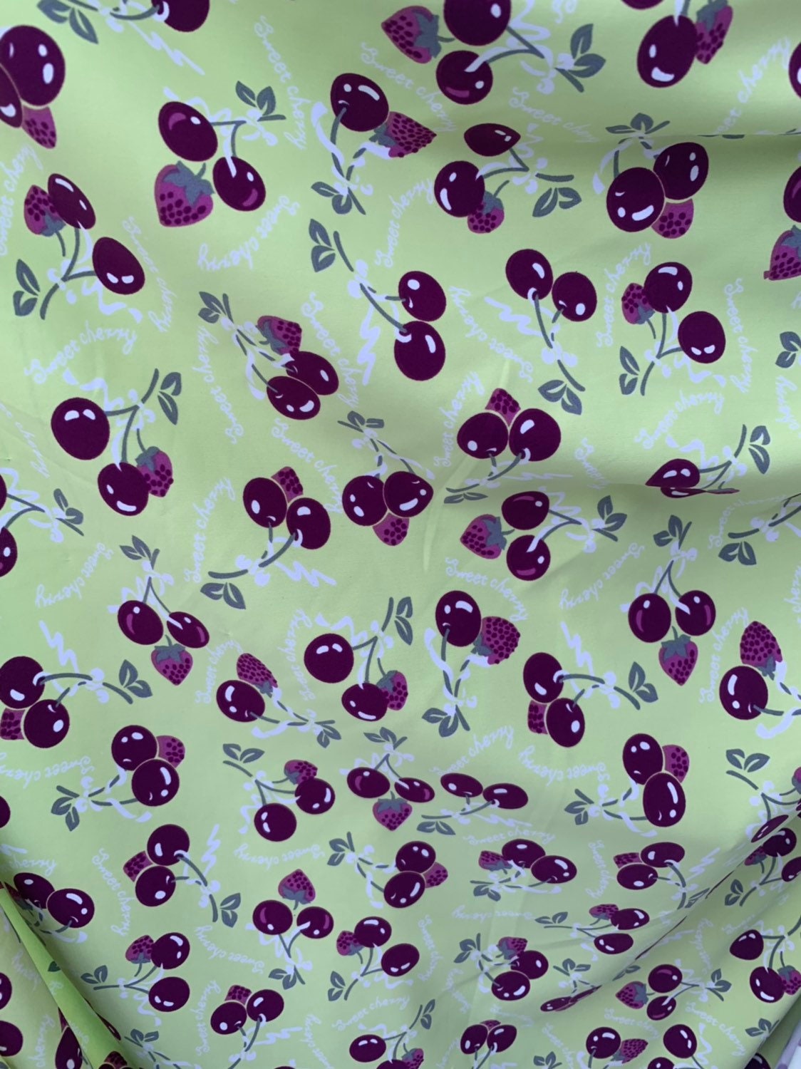 Sweet cherry design print on nylon spandex 4way stretch 58/60" Sold by the YD. Ships worldwide from Los Ángeles California USA.