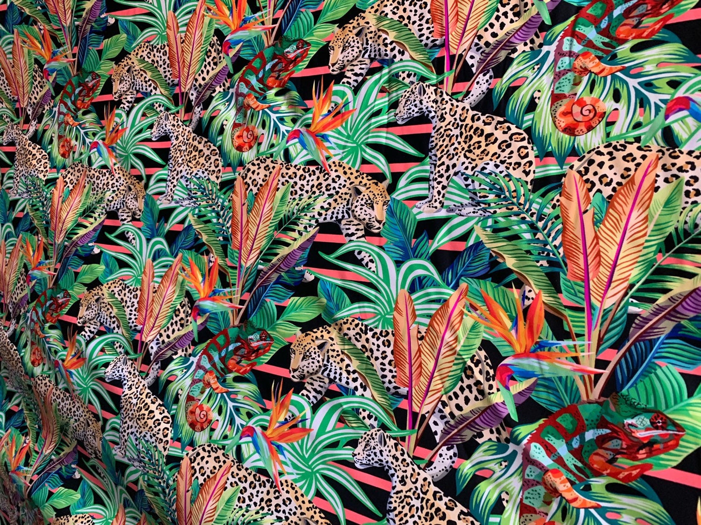 Leopard design print on heavy nylon spandex 4way stretch 58/60" Sold by the YD. Ships worldwide from Los Angeles California USA.