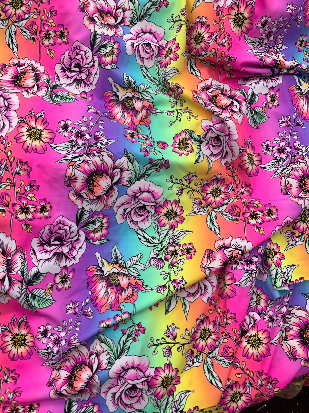 New flower design multicolor print on heavy nylon spandex 4way stretch 58/60" Sold by the YD. Ships worldwide from Los Angeles California.