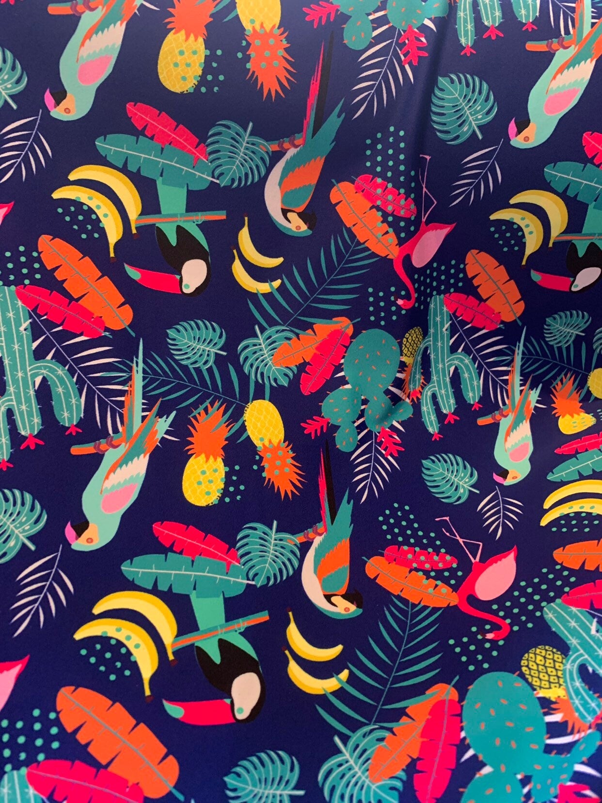 New tropical print nylon spandex multicolor 4way stretch 58/60" Sold by the YD. Ships worldwide from Los Angeles California USA.