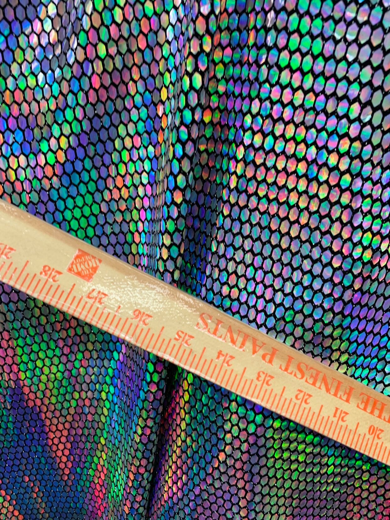 New hexagon hologram sequins on metallic spandex base 4way stretch 58/60" Sold by the YD. Ships worldwide from Los Angeles California USA.
