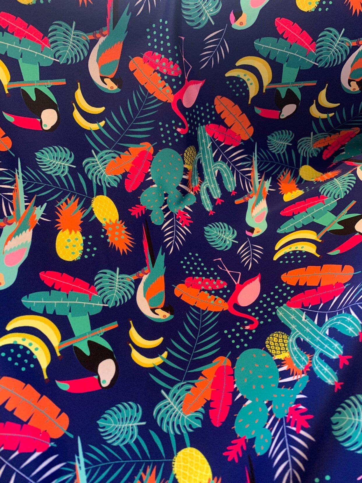 New tropical print nylon spandex multicolor 4way stretch 58/60" Sold by the YD. Ships worldwide from Los Angeles California USA.