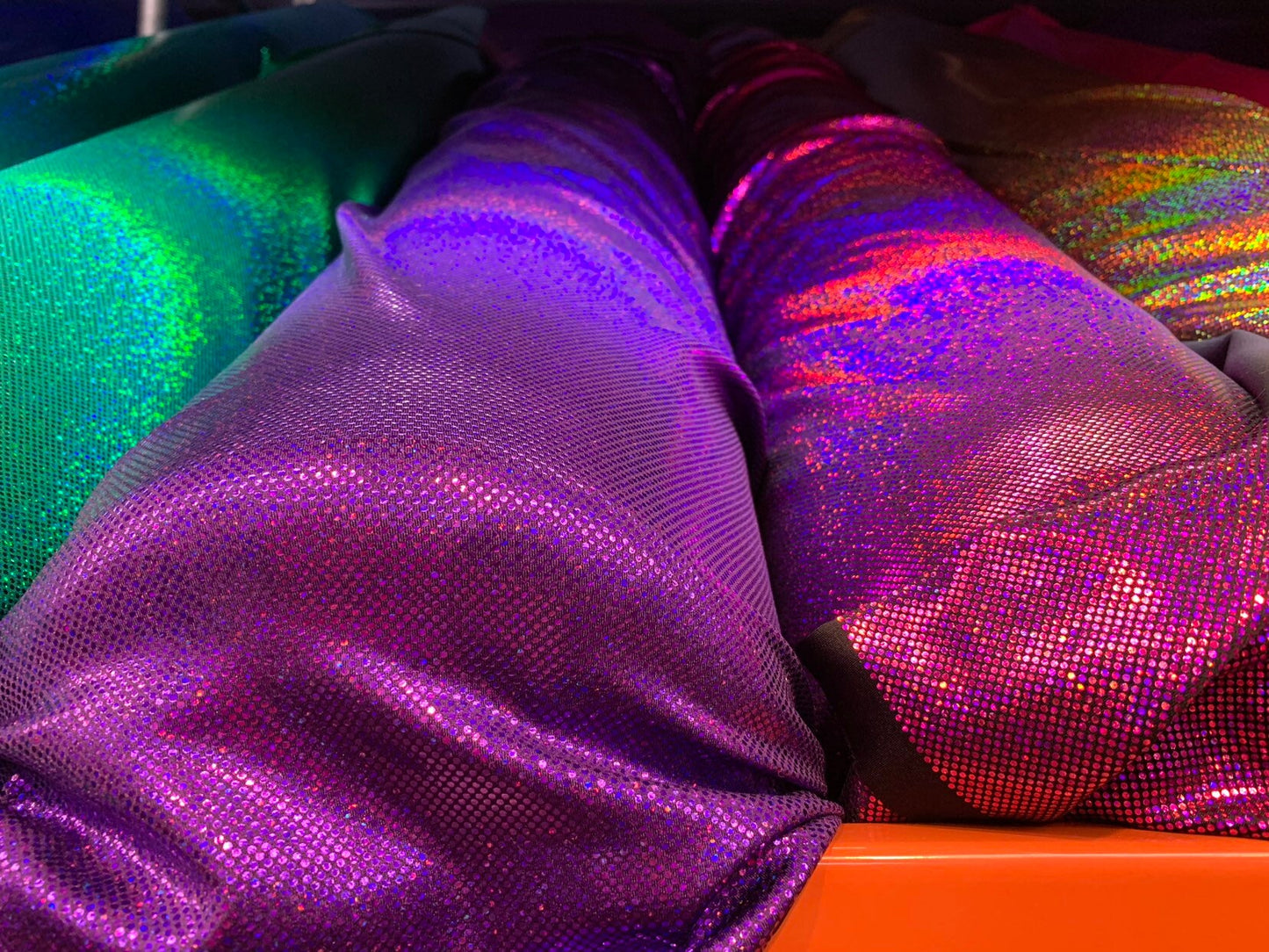 New Hologram metallic dots all over nylon spandex 4way stretch 58/60" Sold by the YD. Ships worldwide from Los Angeles California USA.