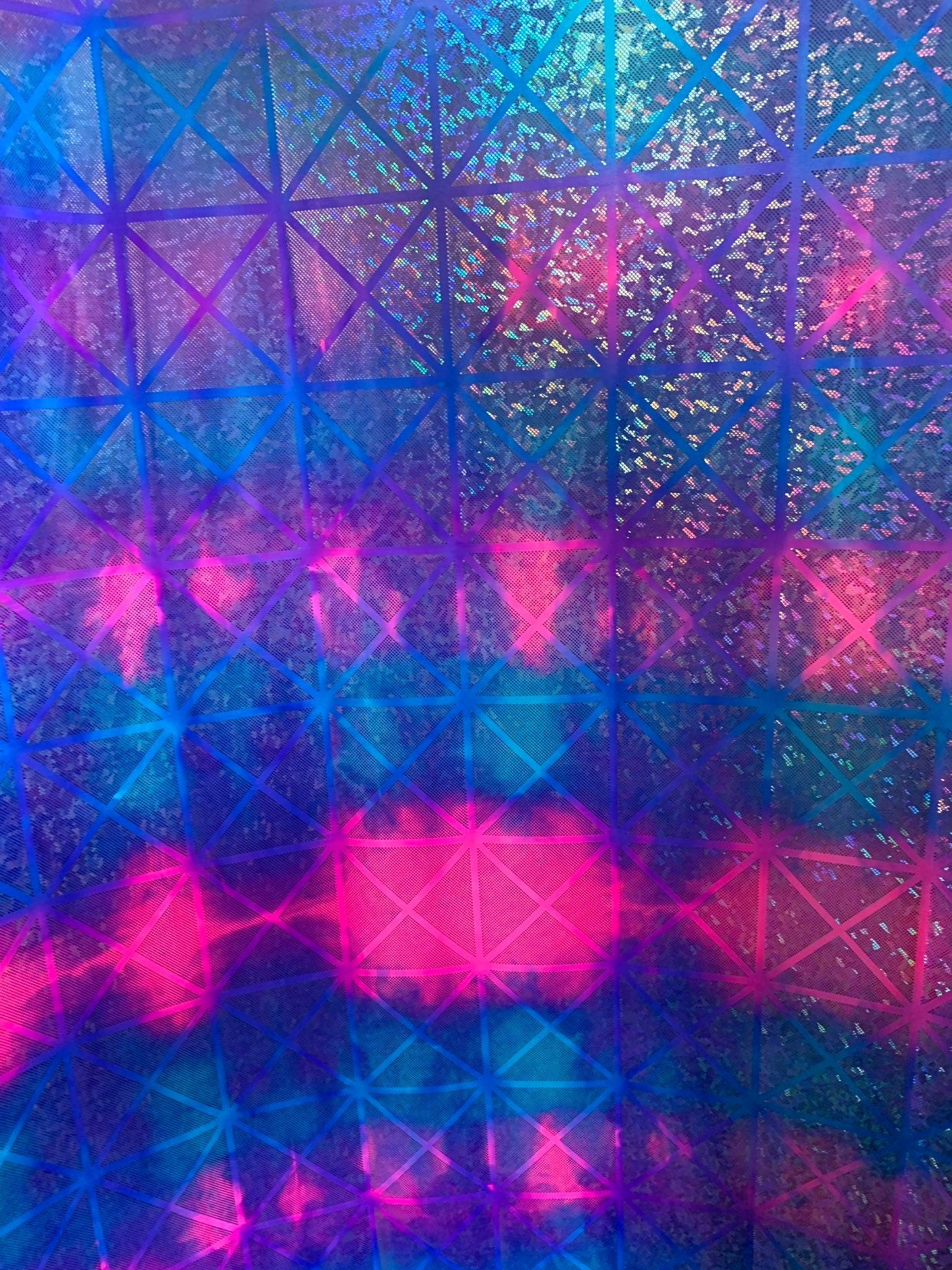Cotton candy Geometric desing hologram tie dye nylon spandex 4way 58/60" sold by the yd. Ships worldwide from Los Angeles California USA.