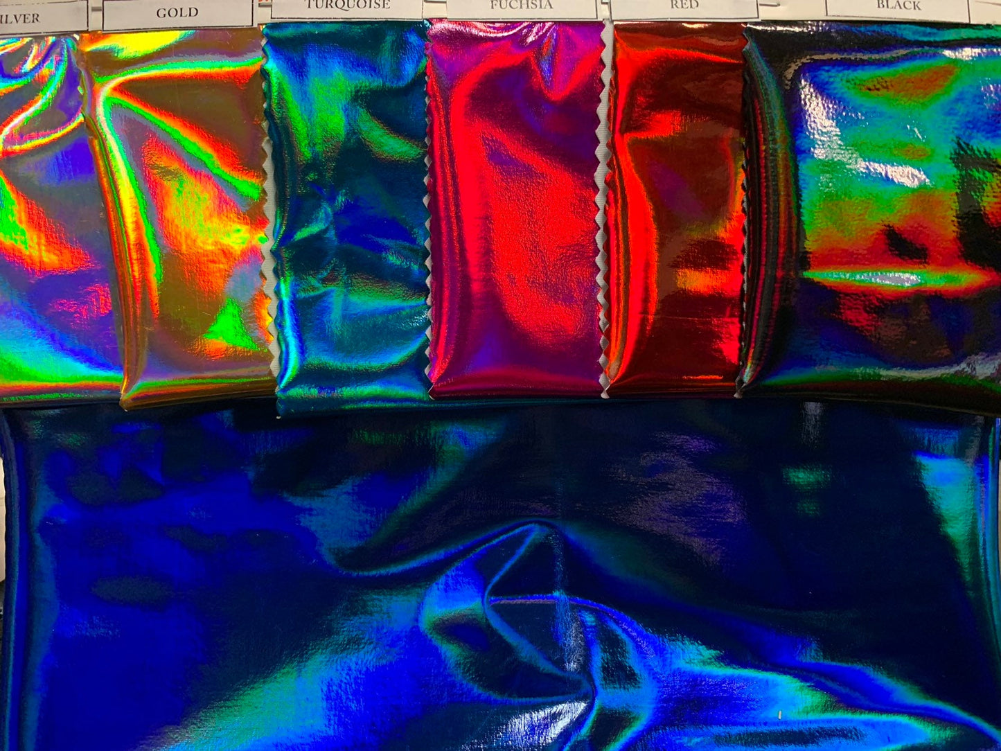 New poly spandex polyurethane coated & holo printed Iridescent super shining vinyl 4-way stretch 58/60" Sold by the YD. Ships worldwide.