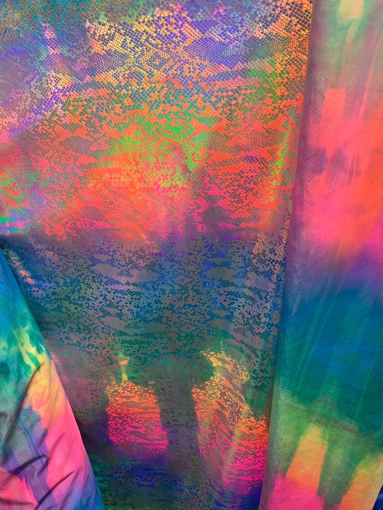 New metallic nylon spandex tie dye iridescent snake foil 4way stretch 58/60" Sold by the YD. Ships worldwide from Los Angeles California USA