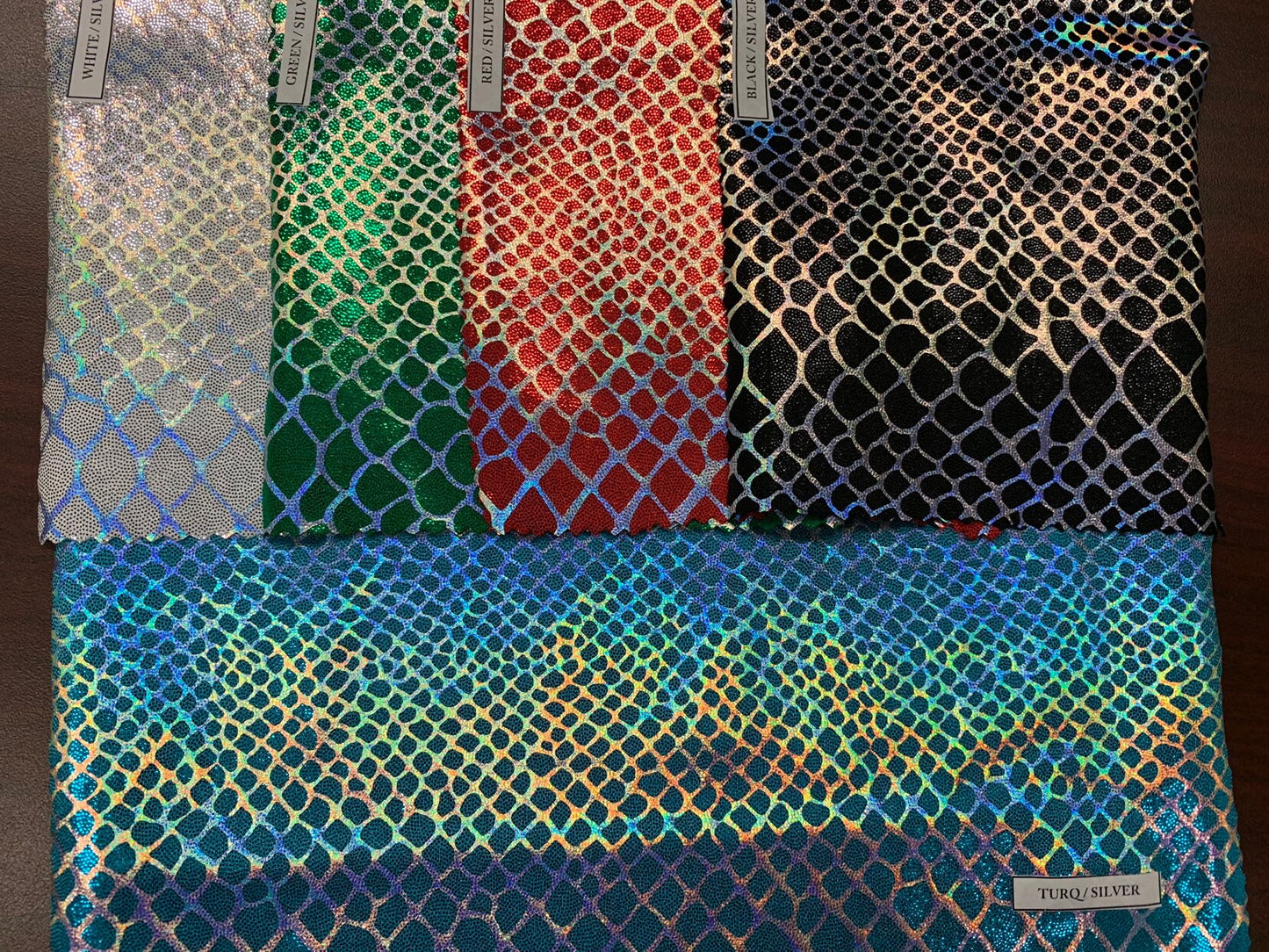 Dragón design Iridescent two tone hologram metallic nylon spandex 4way stretch 58/60" Sold by the YD. Ships worldwide from Los Angeles CA.