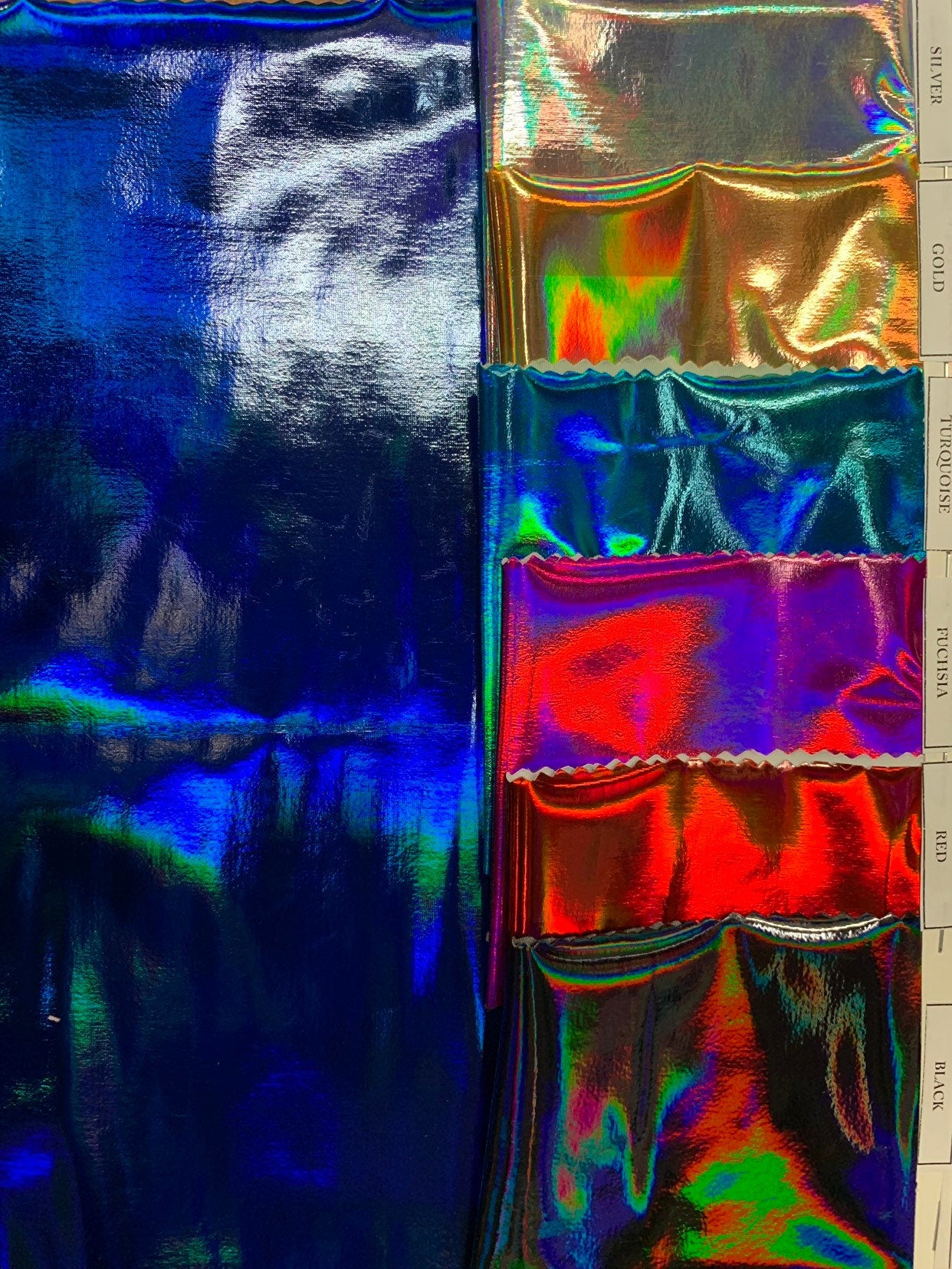 New poly spandex polyurethane coated & holo printed Iridescent super shining vinyl 4-way stretch 58/60" Sold by the YD. Ships worldwide.