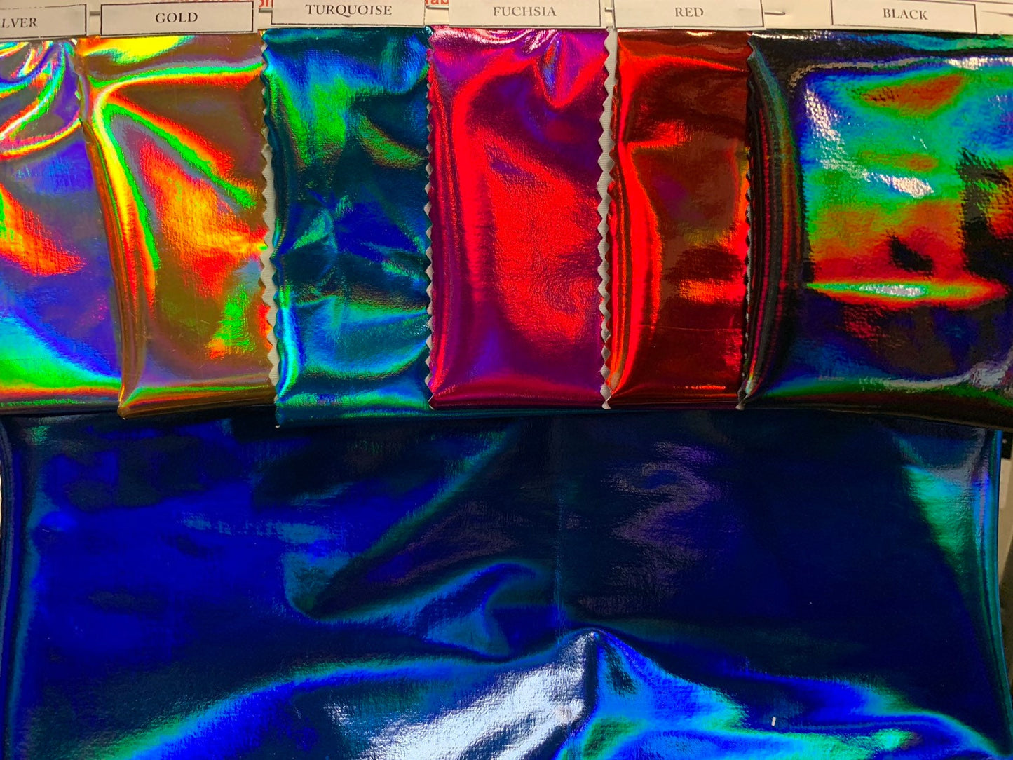 New poly spandex polyurethane coated & holo printed Iridescent super shining vinyl 4-way stretch 58/60" Sold by the YD. Ships worldwide.