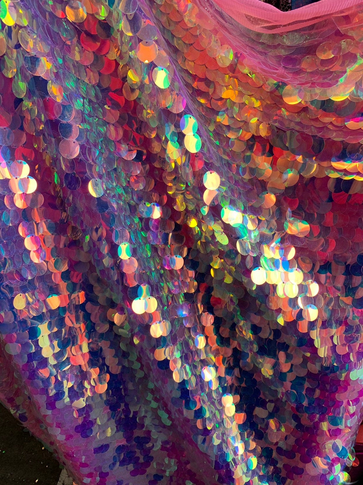New iridescent pink sequins big paillette seq on stretch mesh 2-way 58/60" Sold by the YD. Ships worldwide from Los Angeles California USA.