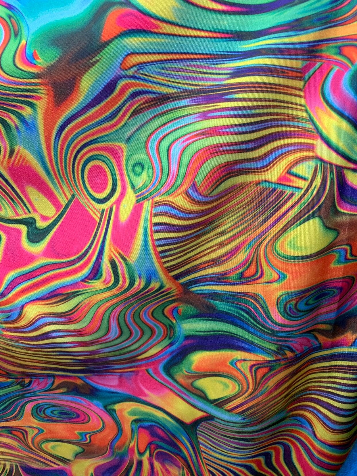 New Neon abstract design multicolor lava print on nylon spandex 4way stretch 58/60" Sold by the YD. Ships worldwide from Los Angeles CA