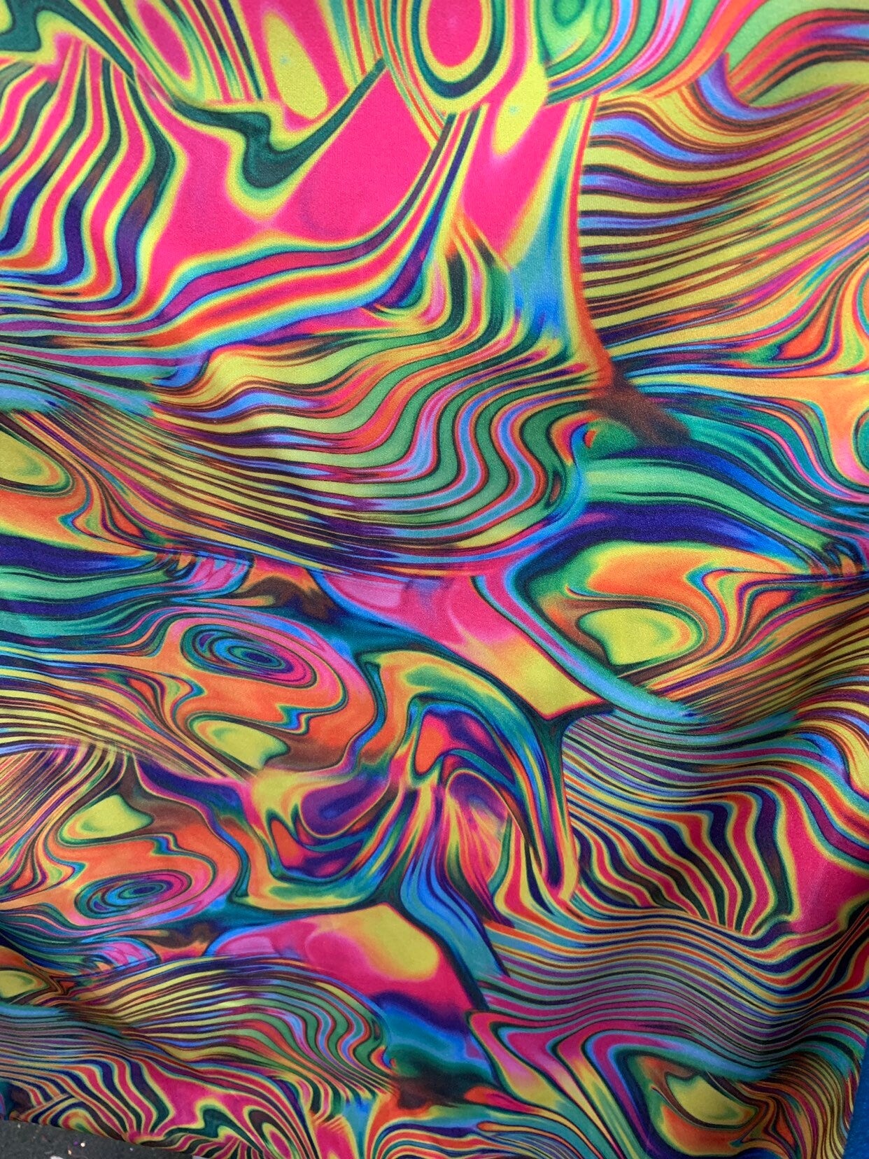 New Neon abstract design multicolor lava print on nylon spandex 4way stretch 58/60" Sold by the YD. Ships worldwide from Los Angeles CA