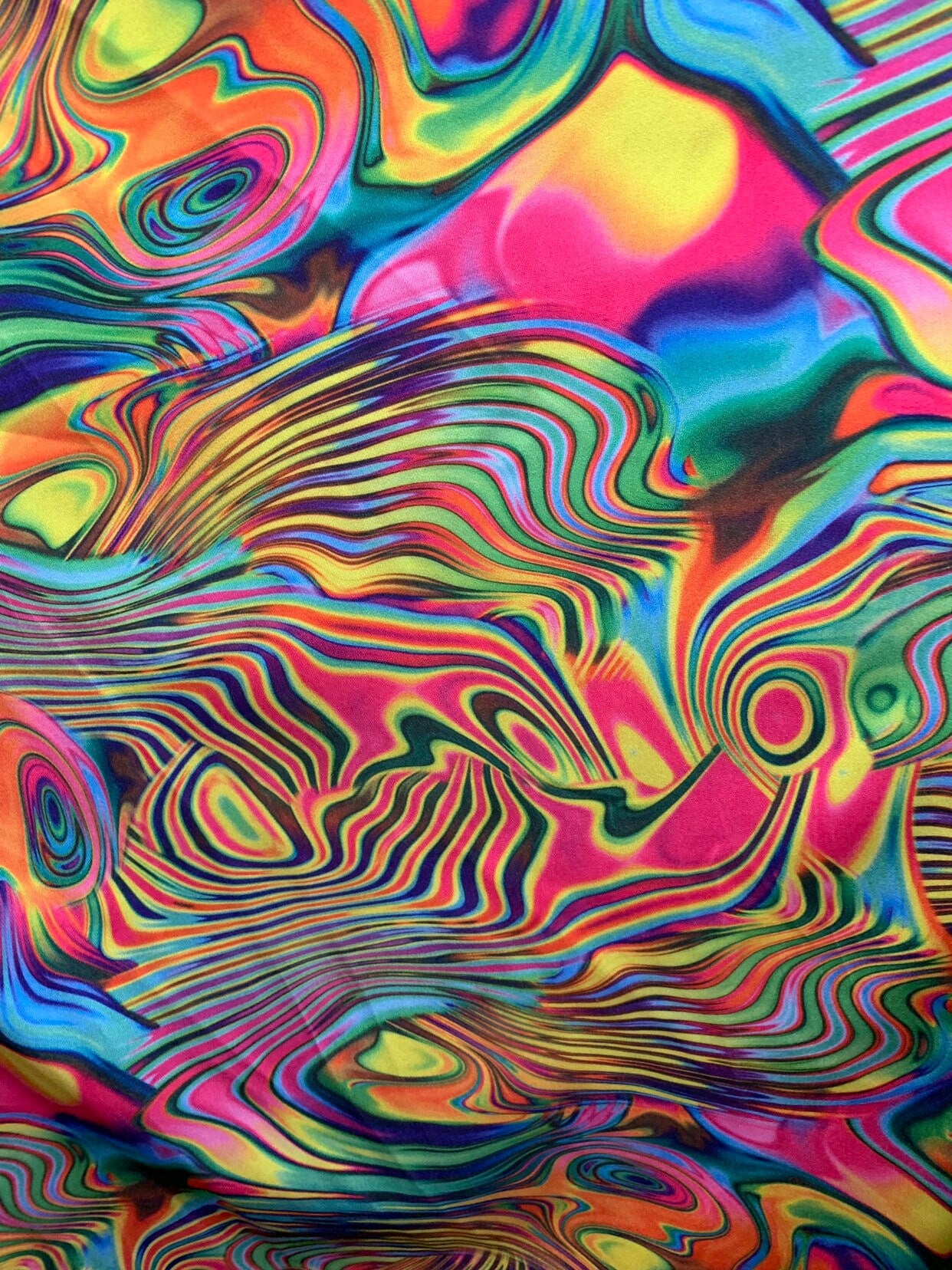 New Neon abstract design multicolor lava print on nylon spandex 4way stretch 58/60" Sold by the YD. Ships worldwide from Los Angeles CA