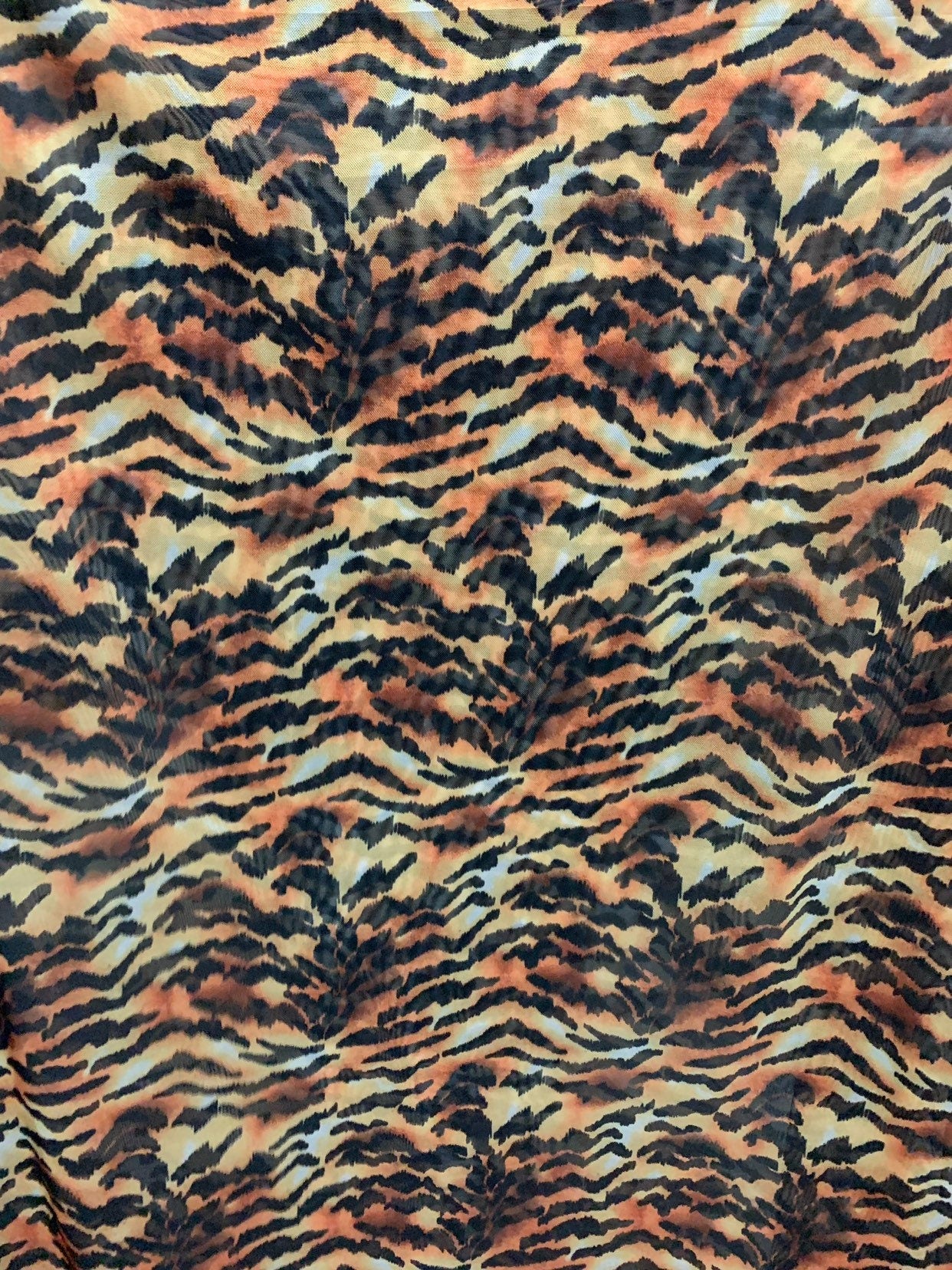New Tiger Exotic design print on chiffon non stretch 58/60" Sold by the YD. Ships worldwide from Los Angeles California USA.