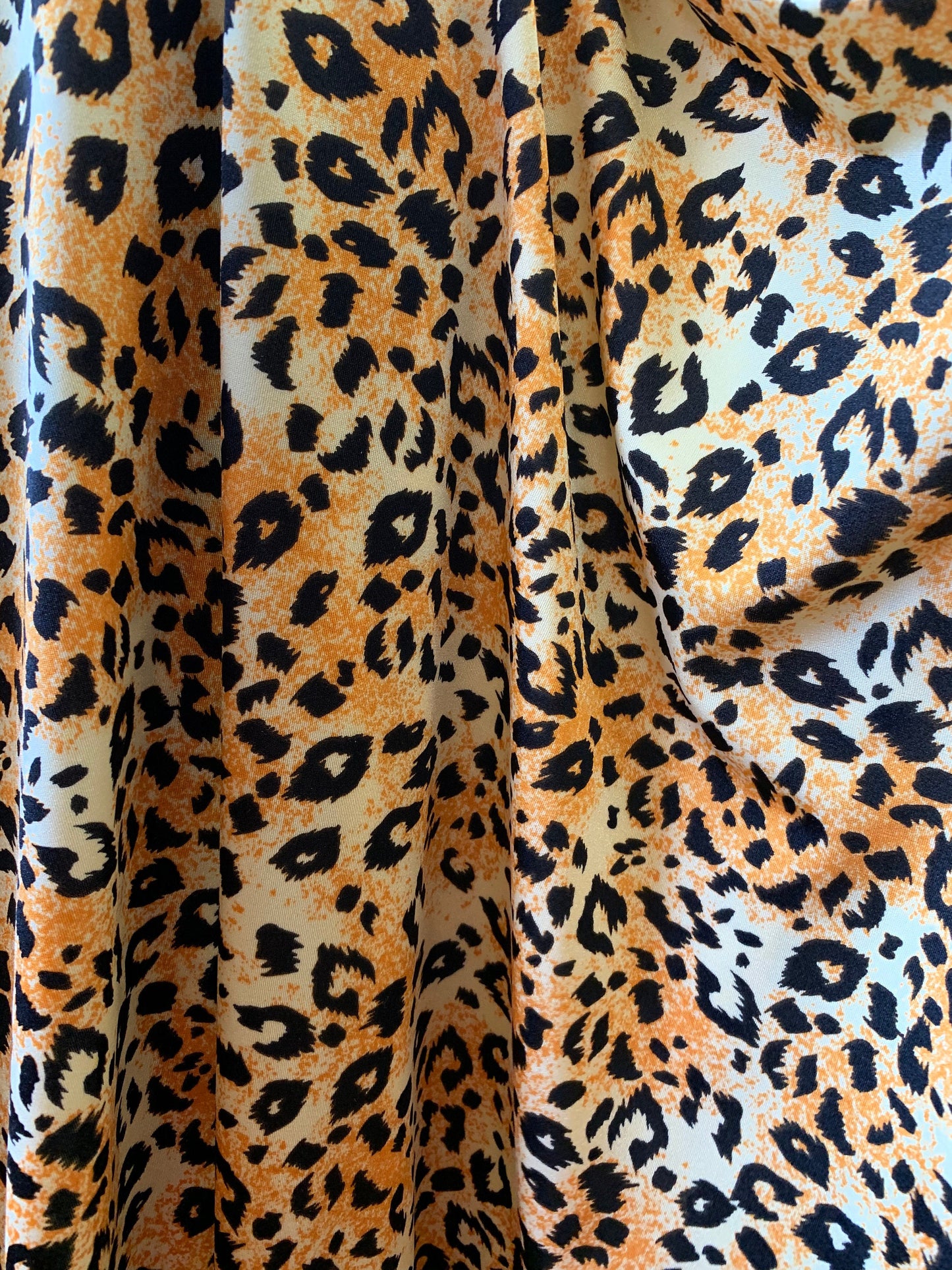 Cheetah design animal print on nylon spandex 4way Stretch 58/60" Sold by the YD. Ships worldwide from Los Angeles California USA
