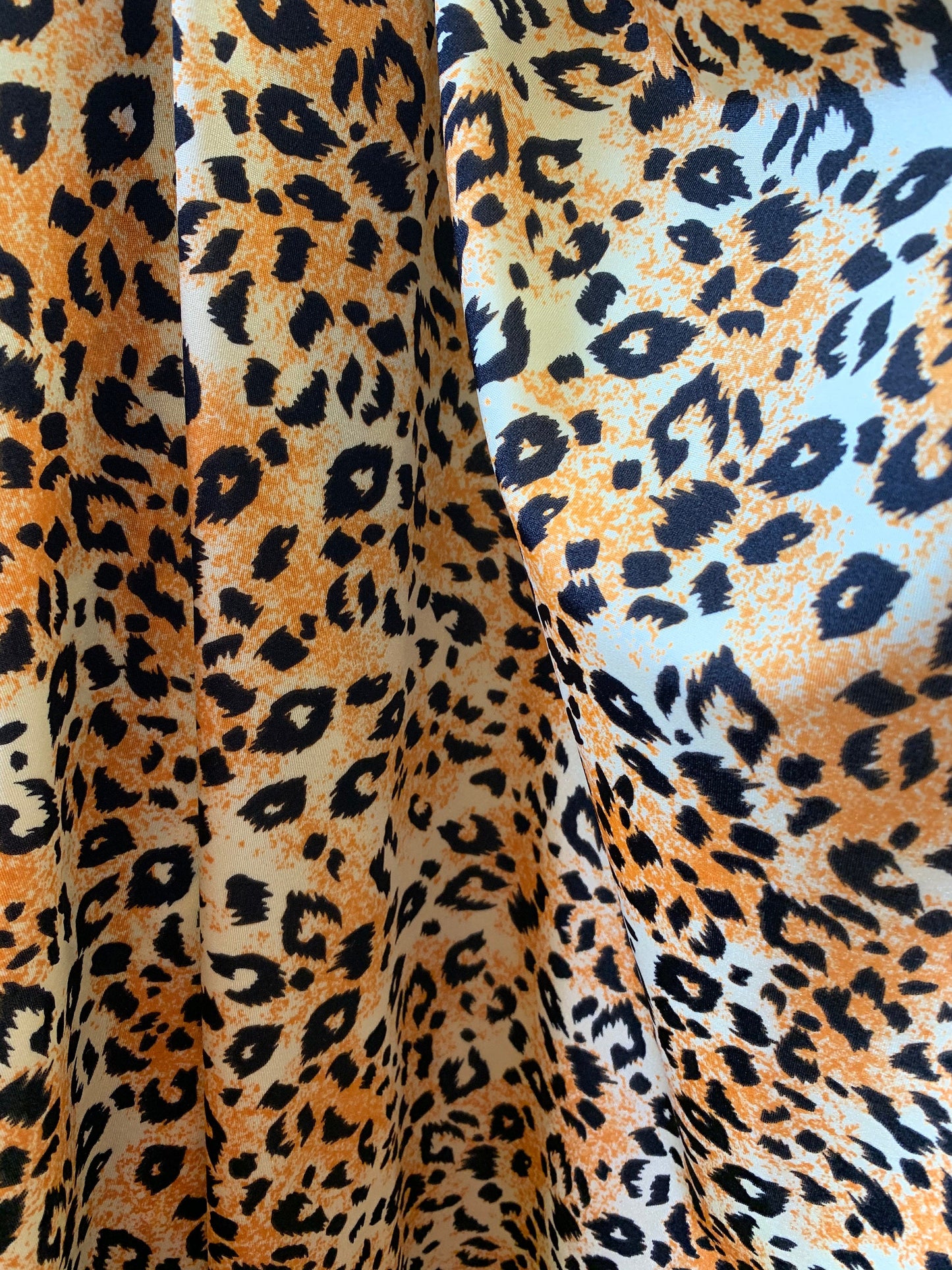 Cheetah design animal print on nylon spandex 4way Stretch 58/60" Sold by the YD. Ships worldwide from Los Angeles California USA